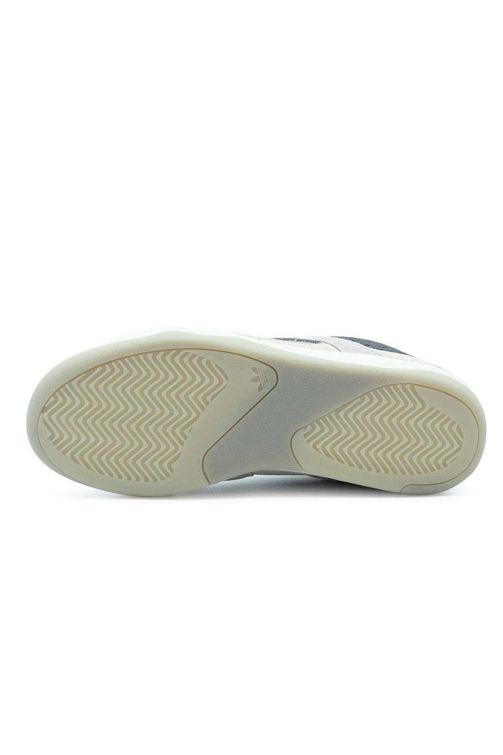 Full bottom perspective of the rubber outsole on the Adidas Bad Bo 1.1, showing the milky translucent gum traction surface with herringbone flex tread patterns across the forefoot and heel, divided by a smooth center bridge featuring a debossed Adidas Trefoil logo