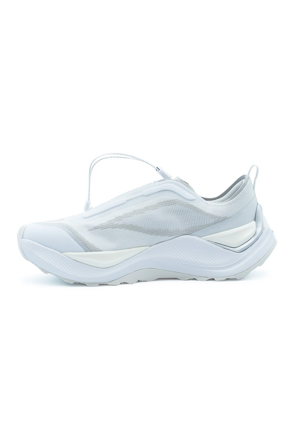 Medial side view of the adidas Holo Peak shoe, emphasizing the seamless, fluid lines of the white technical textile upper and the thick protective Repetitor carrier foam midsole.