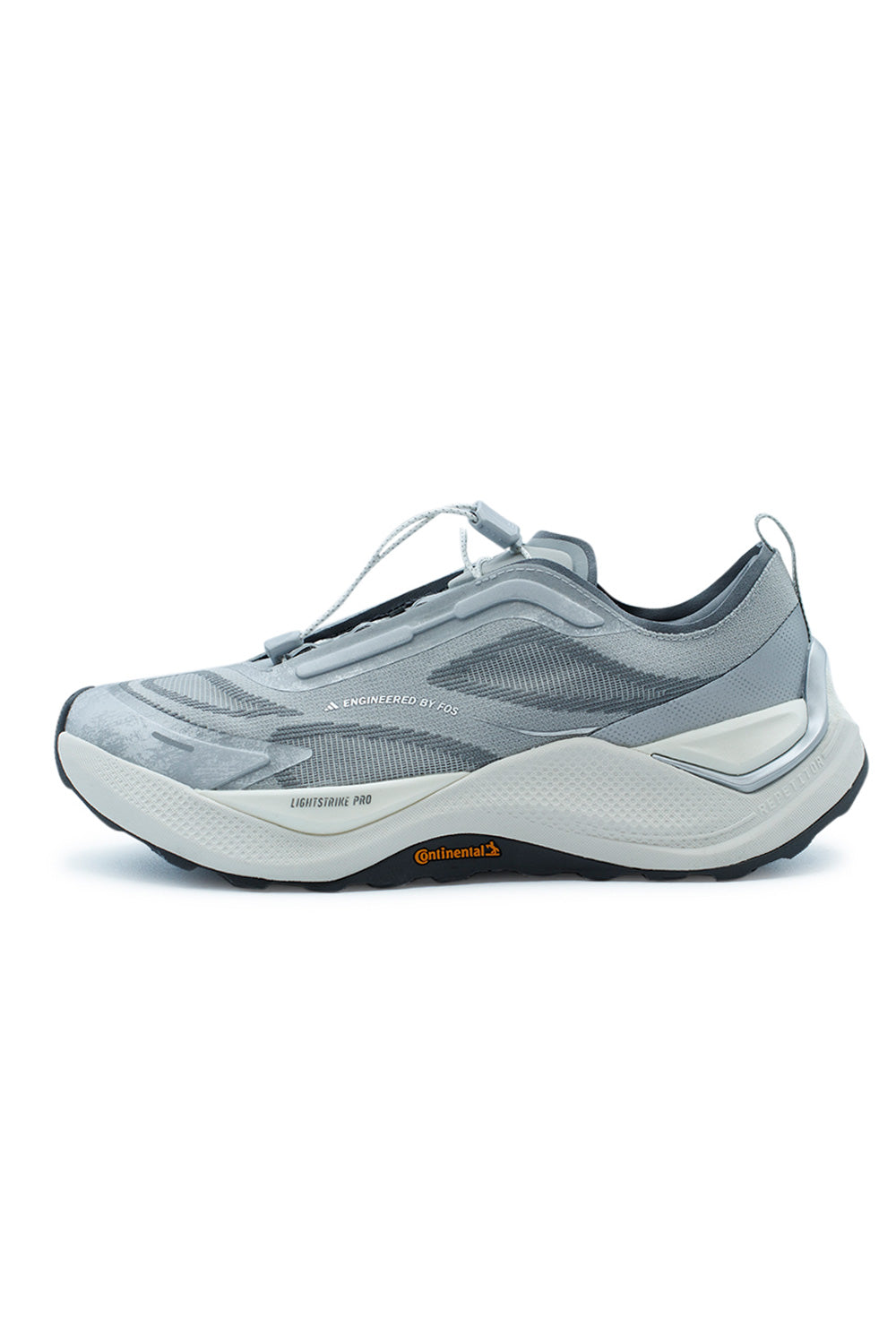 Lateral side view of the adidas Holo Peak sneaker in Core Black and multi-faceted grey, featuring a technical textile upper, chunky white foam midsole, and an orange Continental logo.