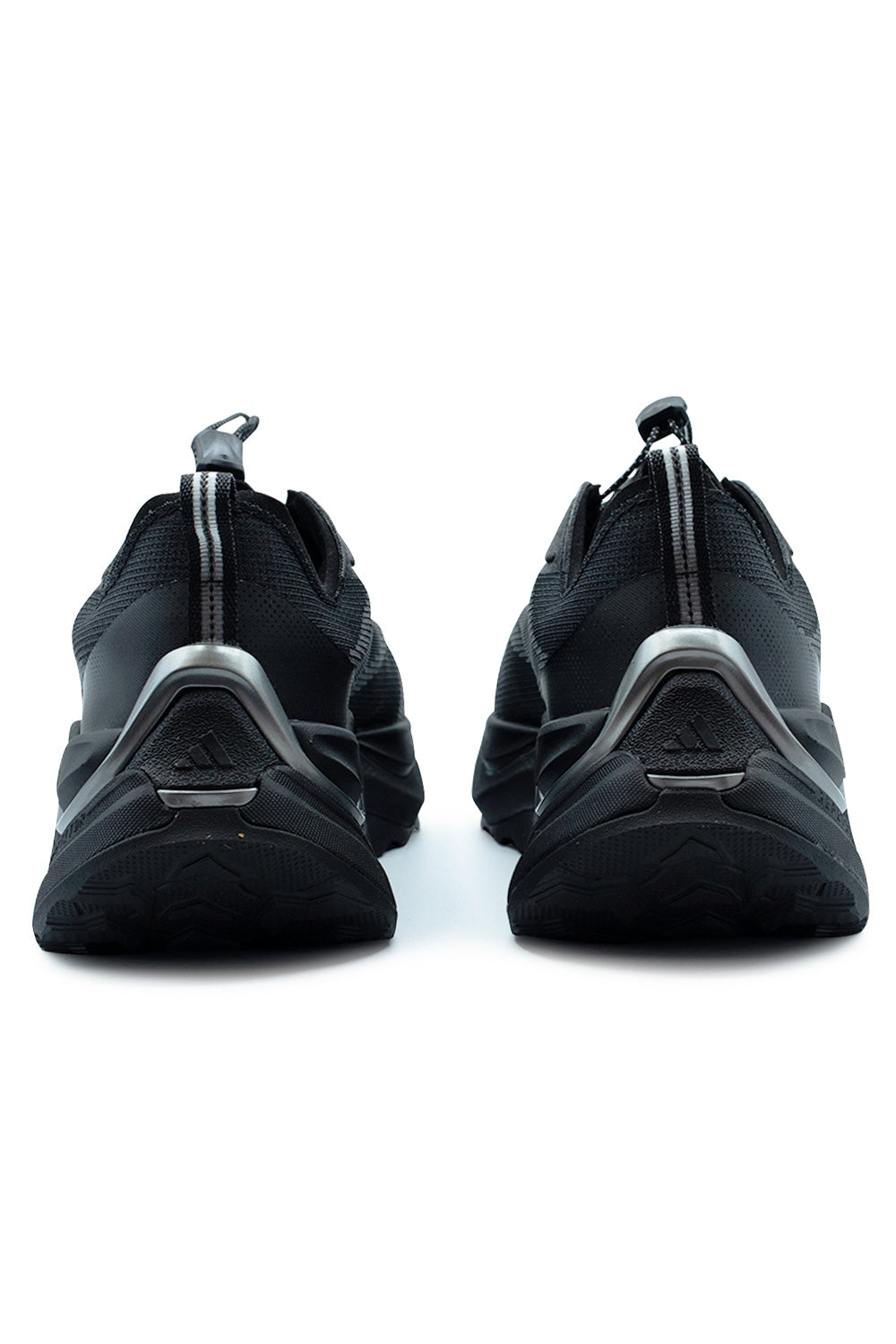 Rear heel view of the black Adidas Holo Peak sneakers, highlighting the sculpted chunky multi-layered midsole, embossed Three Stripes heel emblem, metallic Iron Metallic heel stabilizer clips, and striped nylon pull tabs.