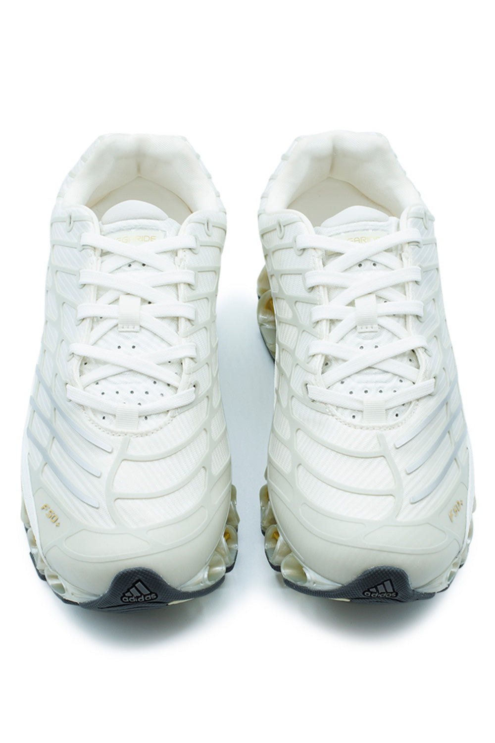 adidas Originals Megaride F50 sneaker showcasing supportive heel design, Ice Gold Metallic accents and iconic open-cell cushioning technology