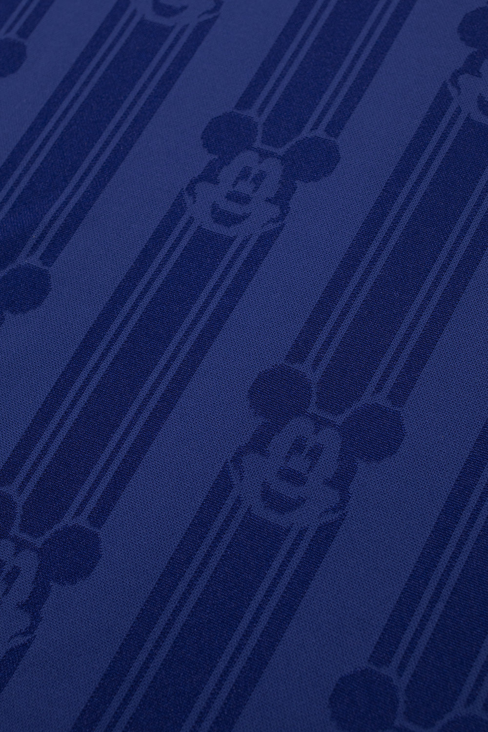 Close-up of the all over woven Mickey Mouse jacquard pattern on the adidas x Brain Dead x Disney Football Jersey Victory Blue showcasing premium polyester fabric inspired by classic 1990s World Cup jerseys