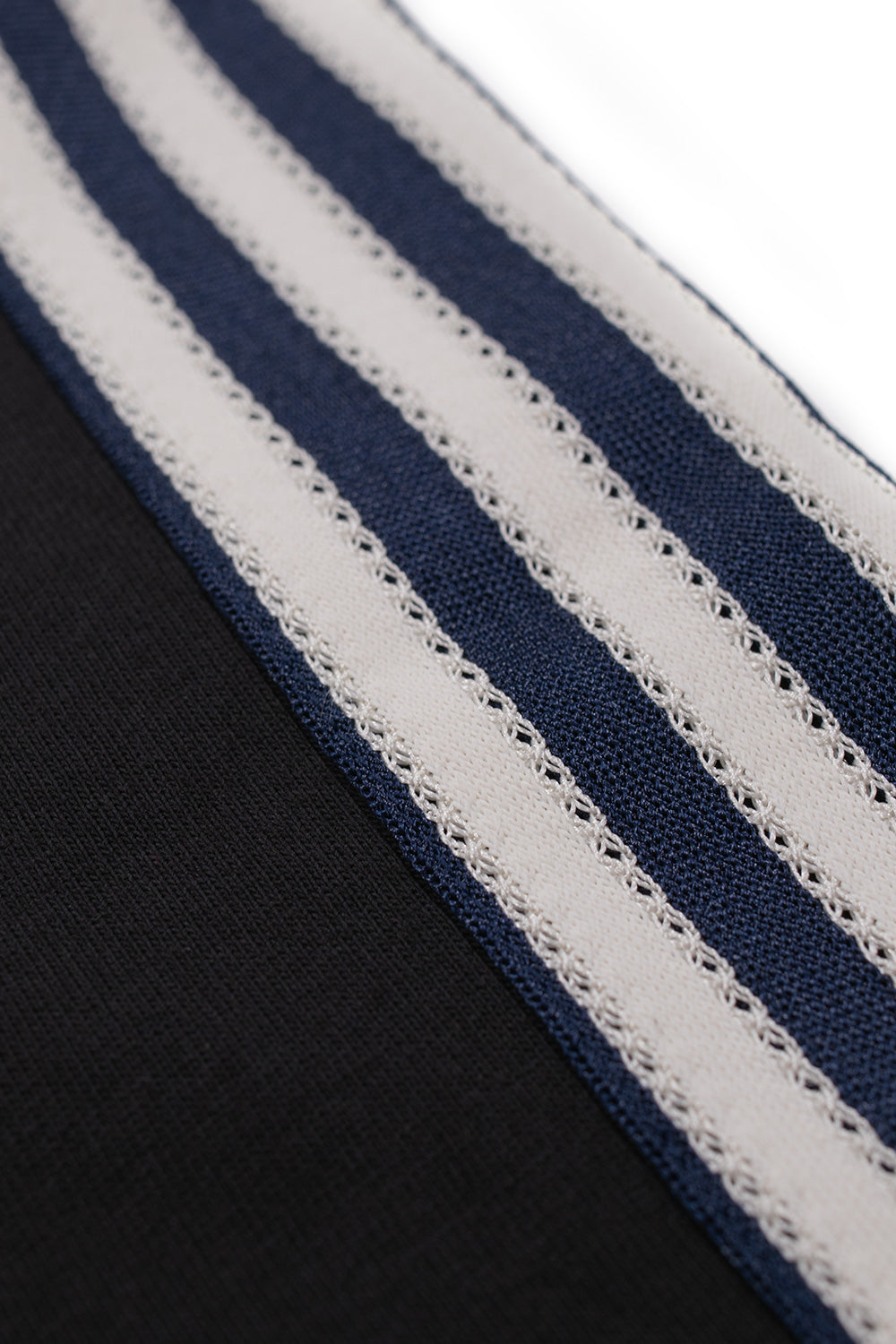 Detailed view of the iconic sewn adidas 3-Stripes running along the shoulder of the Adidas x Brain Dead x Disney T-Shirt Core Navy, combining classic Originals sportswear heritage with modern oversized streetwear aesthetics.