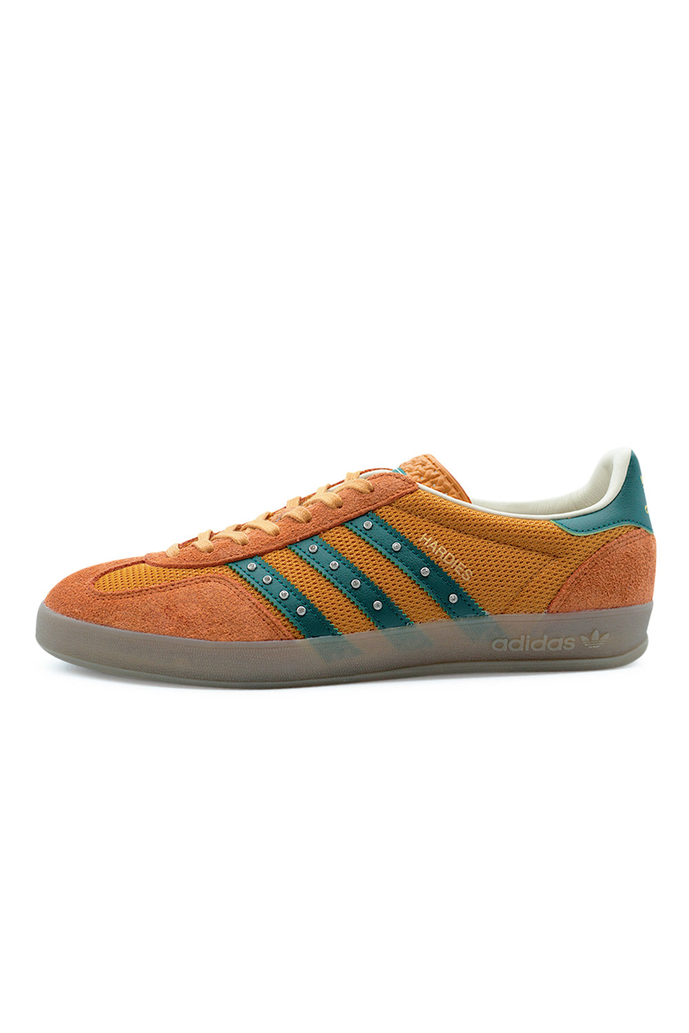 adidas x Hardies Gazelle Indoor Rust Orange Collegiate Green KI7011 side profile sneaker featuring shaggy suede overlays, breathable mesh panels and studded green three stripes on classic gum sole