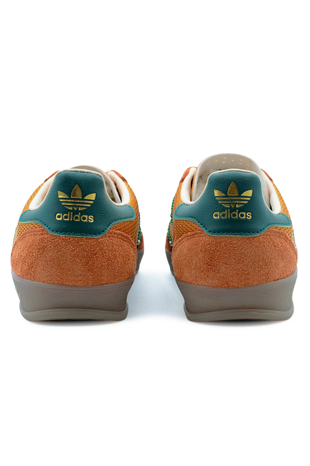 rear view adidas x Hardies Hardware Gazelle Indoor showing leather heel tab with gold Trefoil logo, suede heel counter and cushioned collar in rust orange and green colorway