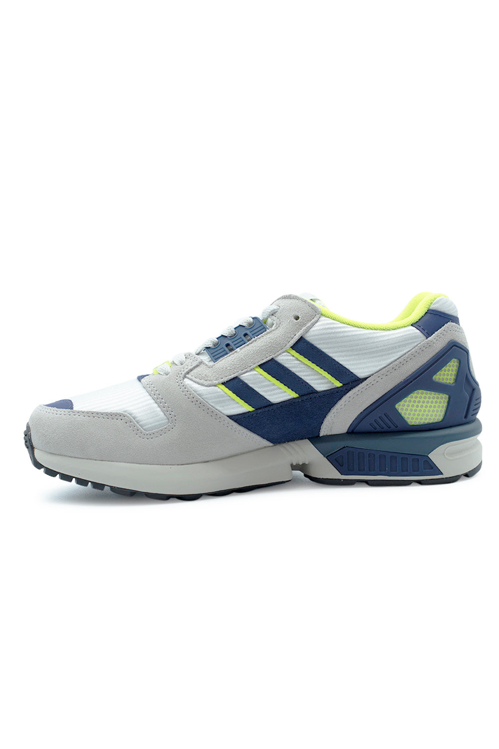 Adidas ZX 8000 Cloud White Dark Blue sneakers angled pair shot highlighting premium suede panels, ventilated mesh base and bold semi yellow details in a vintage tech runner aesthetic
