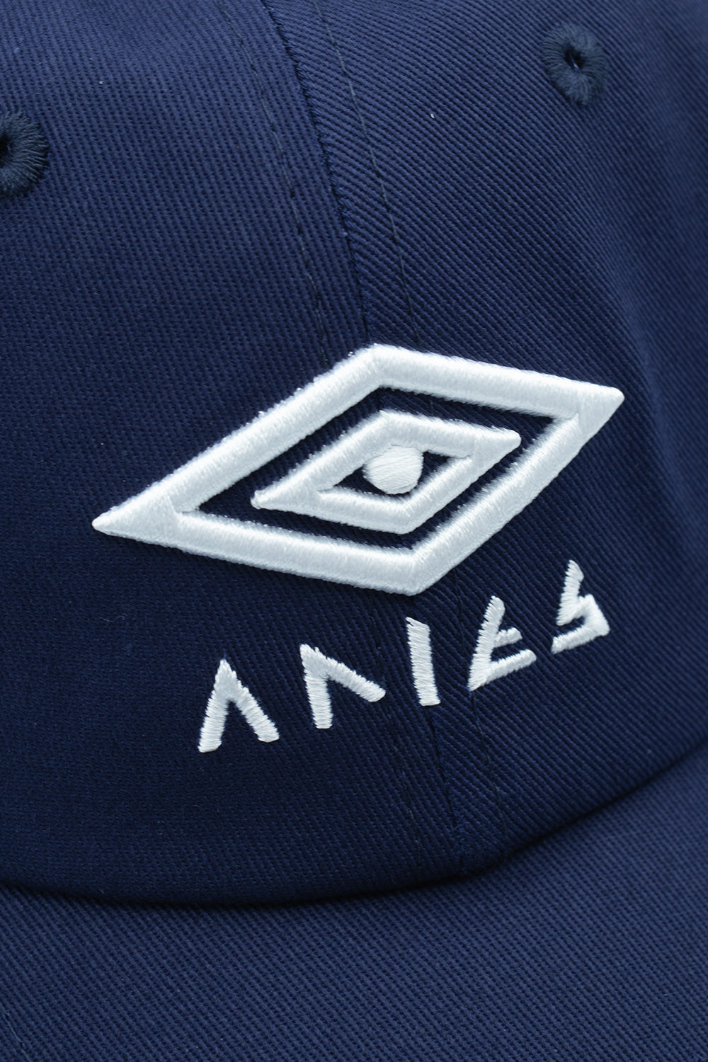 "Aries x Umbro Eye Cap Blue – Modebewusste Baseballkappe in Blau mit markantem Eye-Print für Streetstyle-Fans"