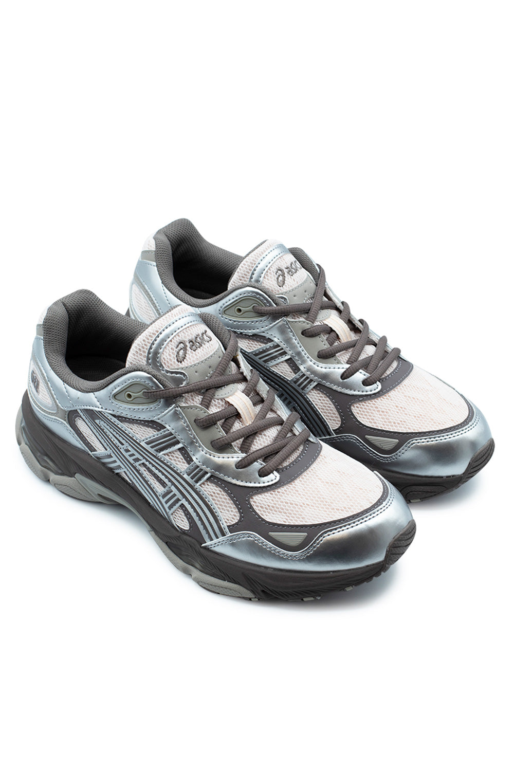 Elevated three-quarter studio view of the Asics Gel-NYC 2.0 in Pink Cloud and Pure Silver, emphasizing the retro-futuristic GEL-1050 upper inspiration, dynamic layering of metallic silver and dark grey panels, and plush ankle collar lining.