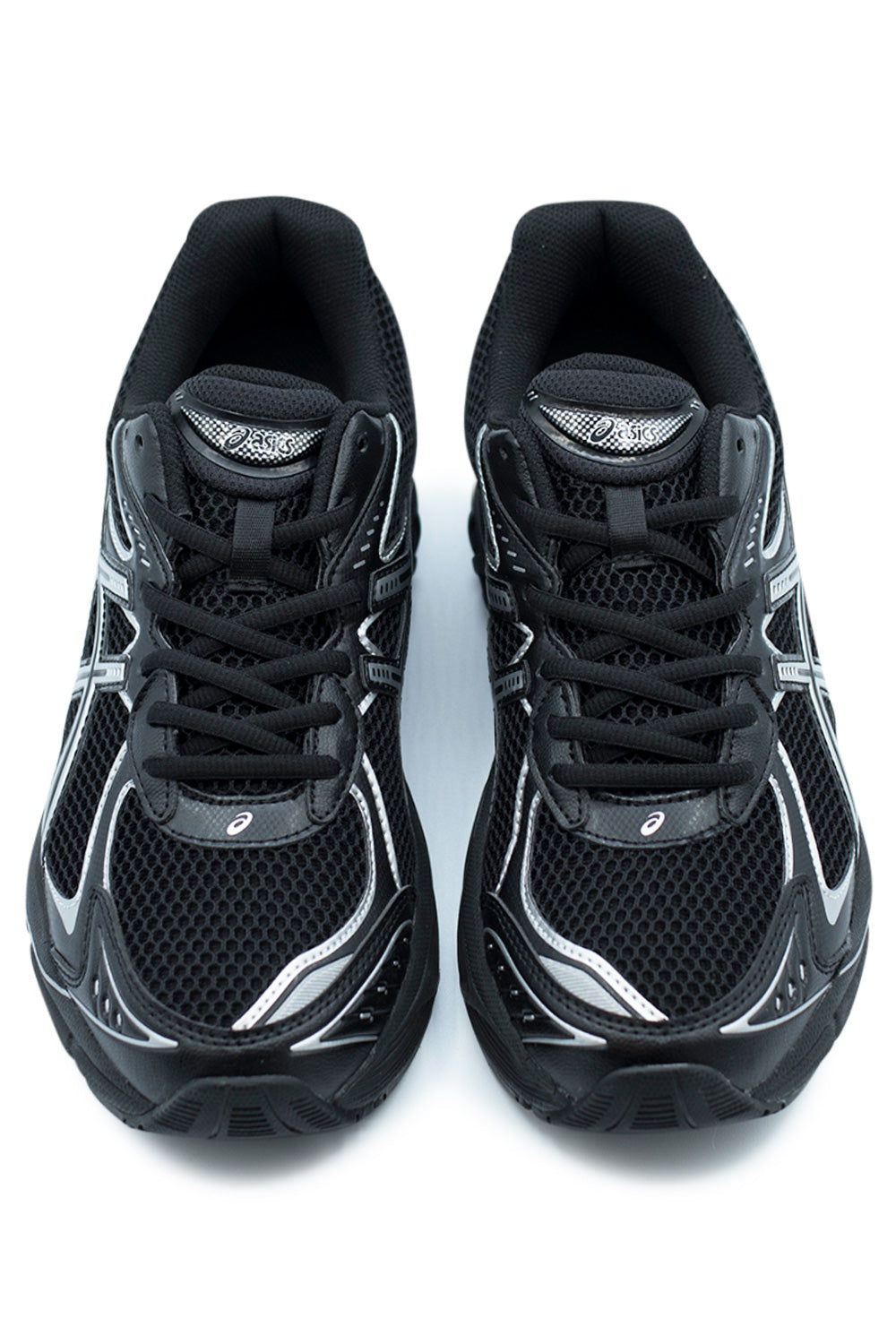 Detailaufnahme des Asics GT-2160 mit wellenförmigem Vorfuß-Design und segmentierter Mittelsohle für dynamischen Style.