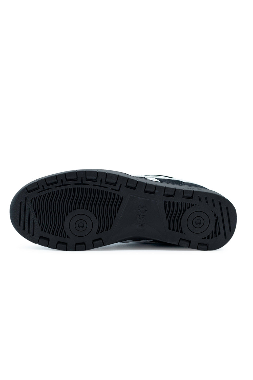 rubber outsole of Asics Japan Pro Black White skate shoe with traction pattern and pivot points engineered for grip, boardfeel and control on skateboard decks