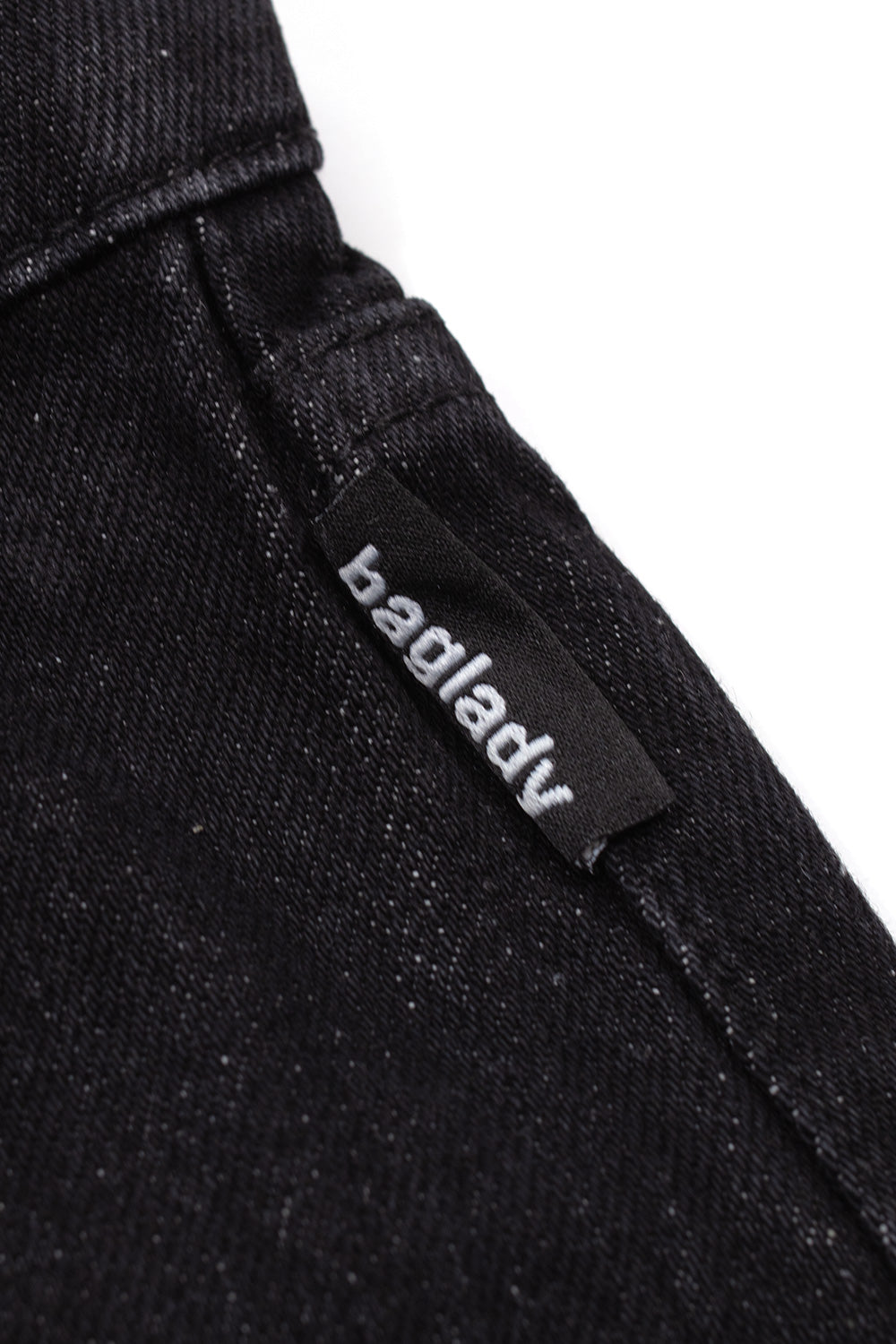 "Seitenansicht der Baglady Denim Baggy Jeans – weit geschnittene Jeans in Schwarz für bequemen und trendigen Style"