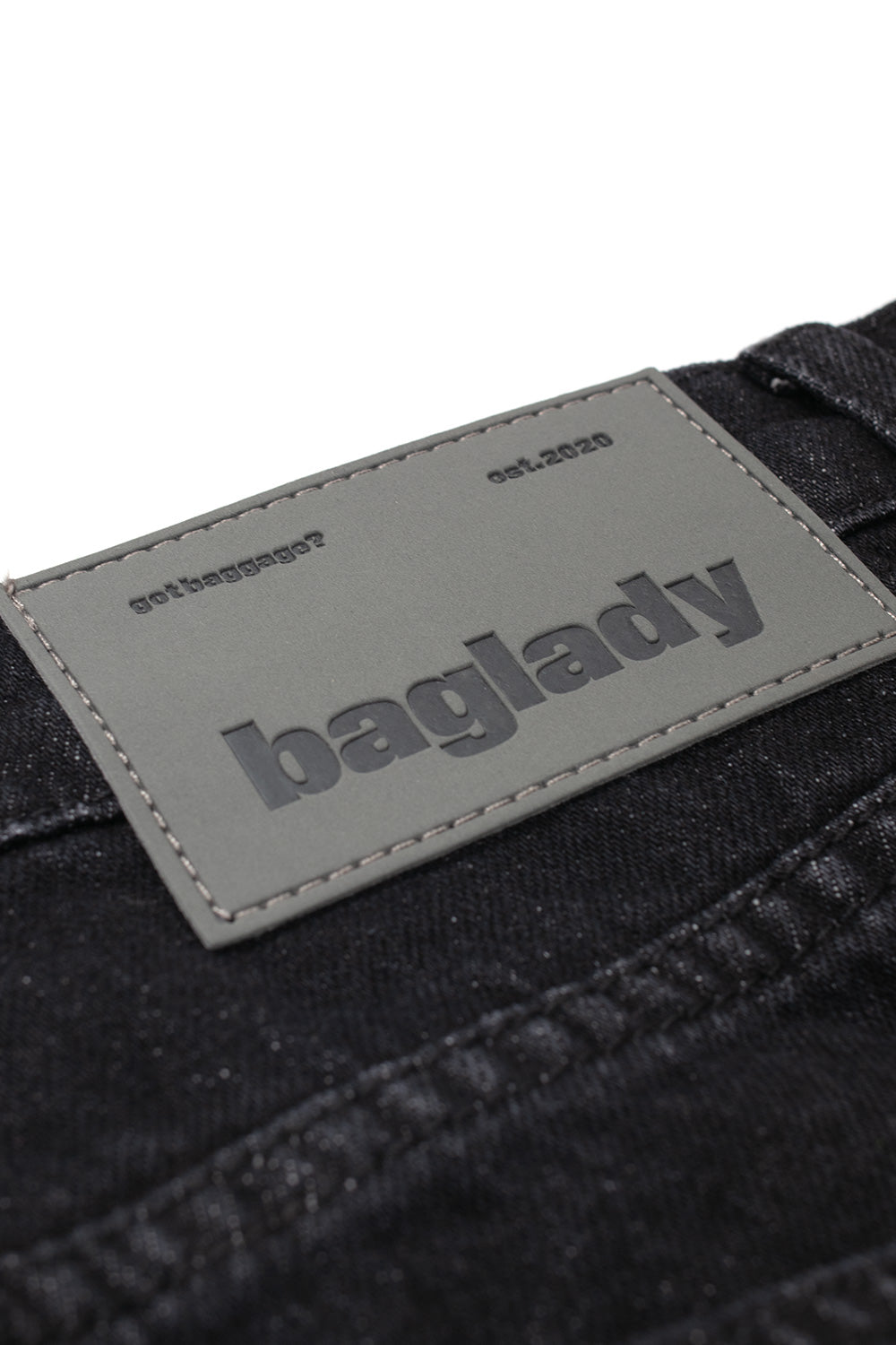 "Seitenansicht der Baglady Denim Baggy Jeans – weit geschnittene Jeans in Schwarz für bequemen und trendigen Style"