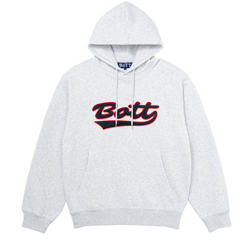 Front flat lay studio view of the BoTT Script Logo Hoodie in Ash heather grey, showcasing a relaxed heavyweight fleece hooded sweatshirt with matching tubular drawstrings, classic kangaroo pouch pocket, ribbed cuffs and hem, and a prominent center chest appliqué embroidery featuring the cursive "BoTT" script logo in black felt bordered by red satin stitching with an underlined tail.