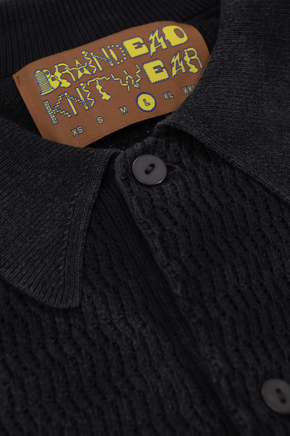 Brain Dead Pigment Dye Long Sleeve Polo Sweater Ink collar detail – textured knit polo collar with button closure and Brain Dead woven label