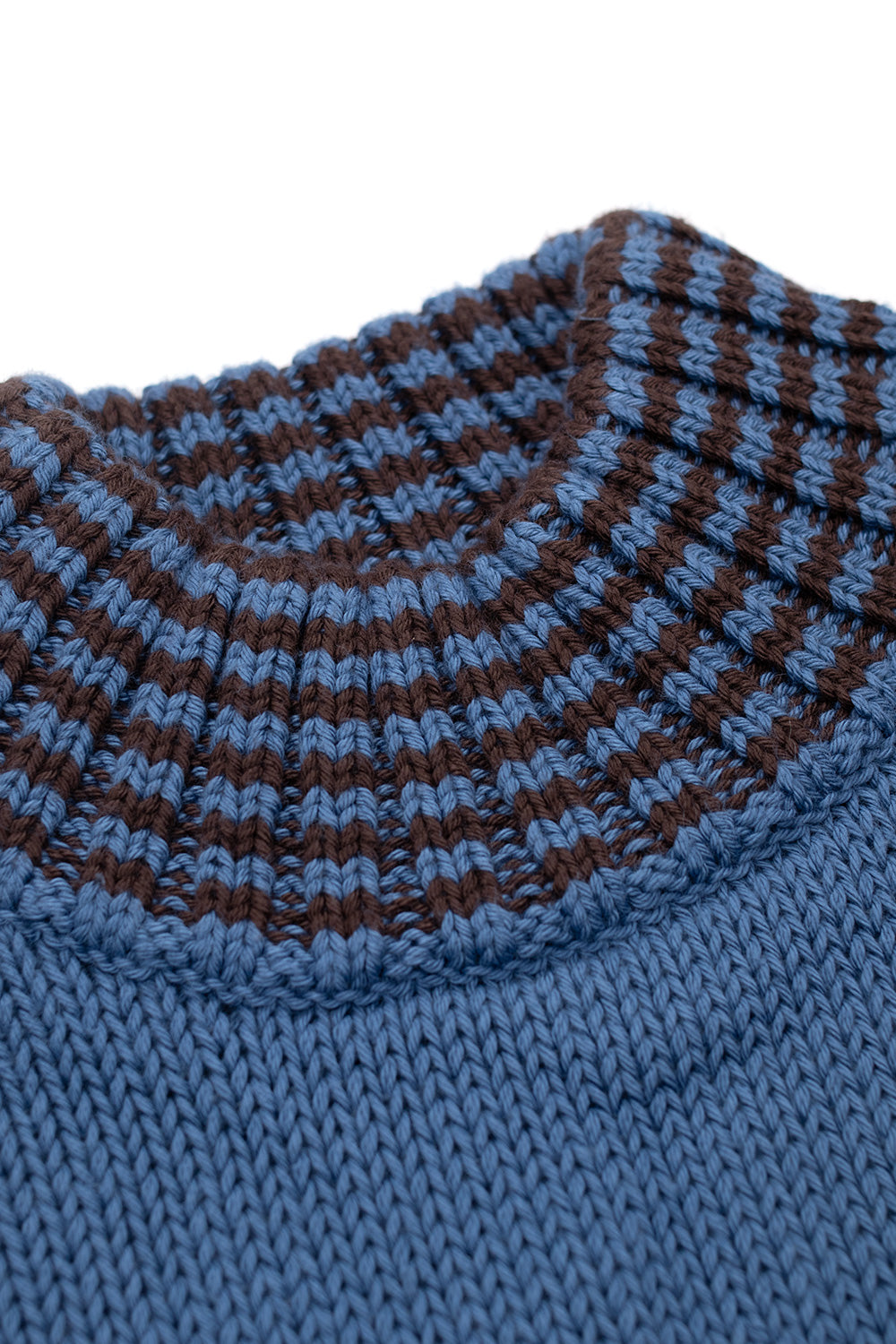Close-up of Brain Dead Turtle Neck Sweater Blue showing striped ribbed turtleneck collar with contrasting brown and blue knit pattern in soft pima cotton fabric