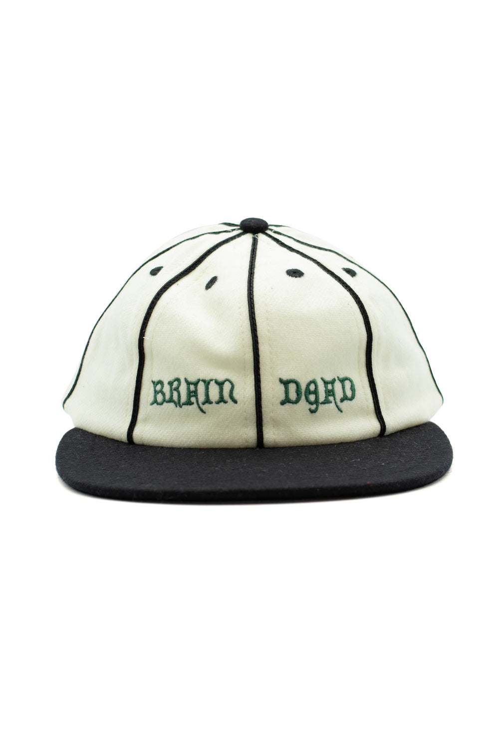 Brain Dead Wool Flannel 8 Panel Hat Natural – Klassische Dad Cap aus weichem Woll-Flanell mit gesticktem Logo, schwarzer Kontrastnaht und Lederriemen.