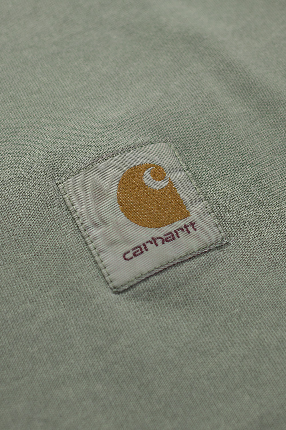 Carhartt WIP Nelson Tee Park – Leichtes 195 g/m² Baumwollshirt mit atmungsaktivem Jersey-Stoff und ikonischem Square Label auf der Brust.