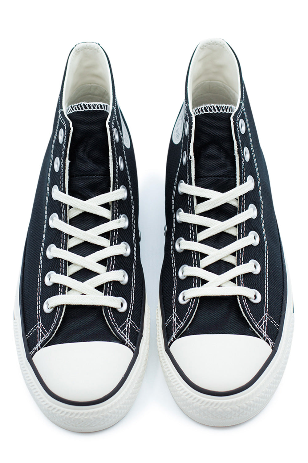 Converse CTAS Pro Mid mit schwarzem Canvas-Obermaterial, Gummiverstärkungen und Egret-Sohle