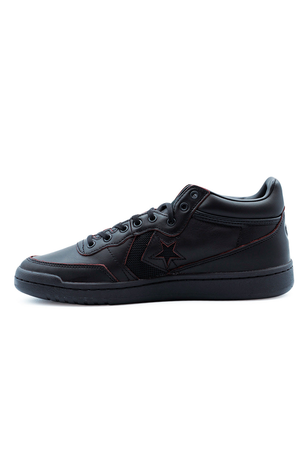 Seitlicher Blick auf den schwarzen Mid-Top Sneaker mit transparenter Gummiaußensohle und CX-Dämpfung für hohen Tragekomfort