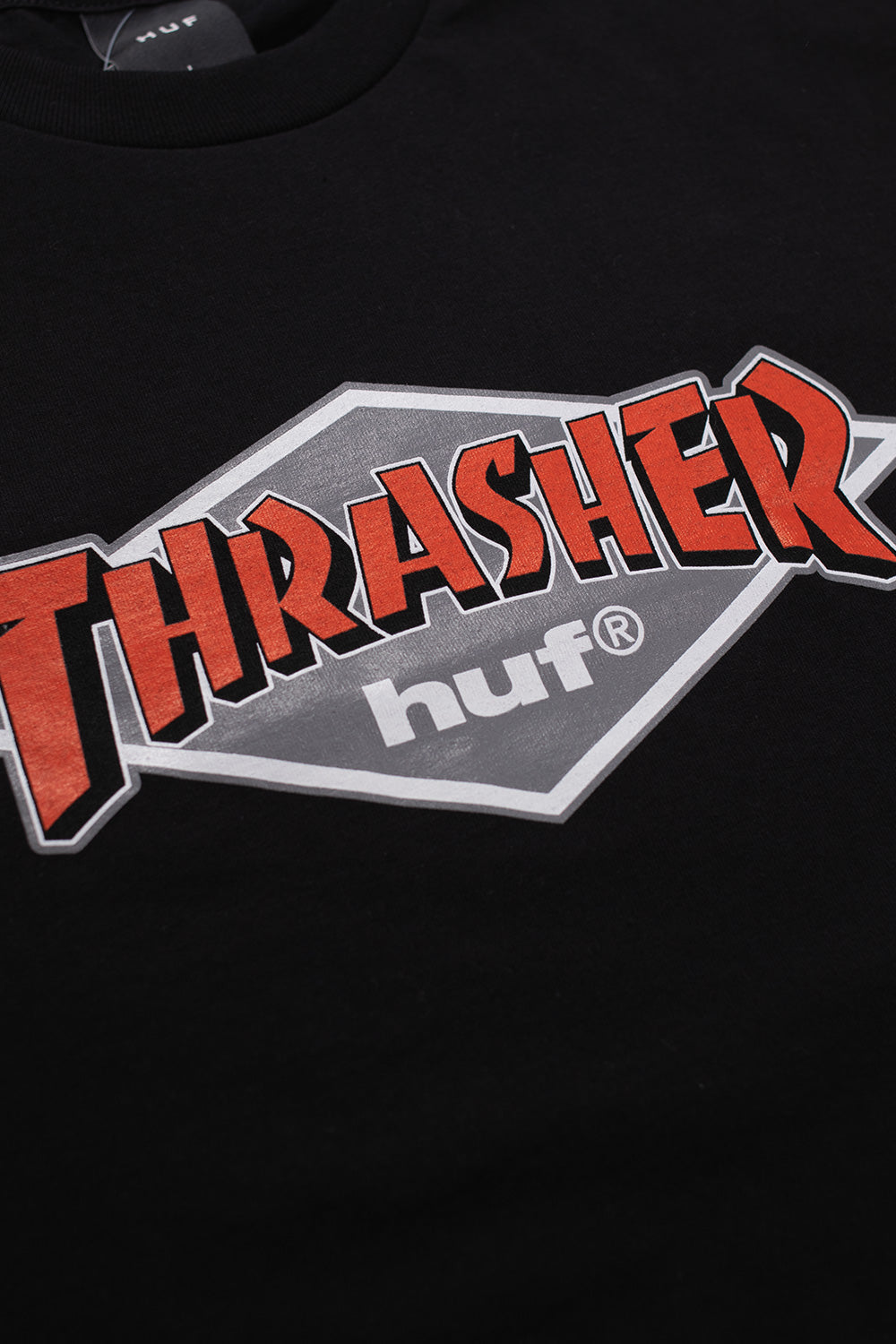 Unisex HUF x Thrasher Black Logo Tee, minimalist streetwear shirt with iconic graphic branding from the exclusive capsule release.