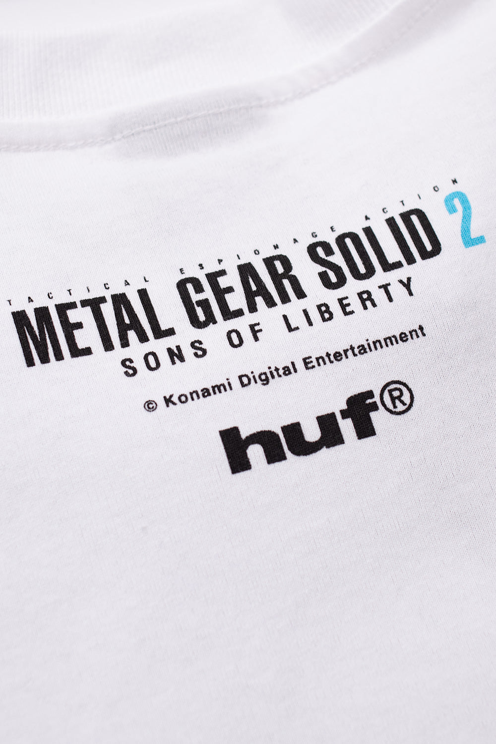 Limited edition HUF Metal Gear Solid Tanker T-Shirt White featuring cinematic stealth-action artwork, inspired by classic Konami game visuals, heavyweight 250 gsm cotton gaming streetwear top made in Mexico