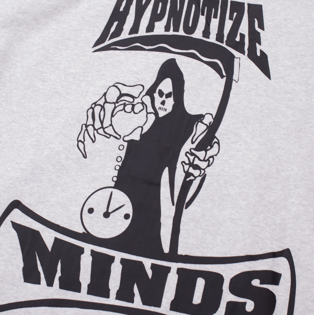 Detailed close-up shot of the rear graphic print on the Huf X Three 6 Mafia Memphis PO Hoodie, displaying the stark black illustration of the scythe-wielding grim reaper, the hour hand clock face, and the arched "HYPNOTIZE MINDS" banner on soft grey melange fleece.