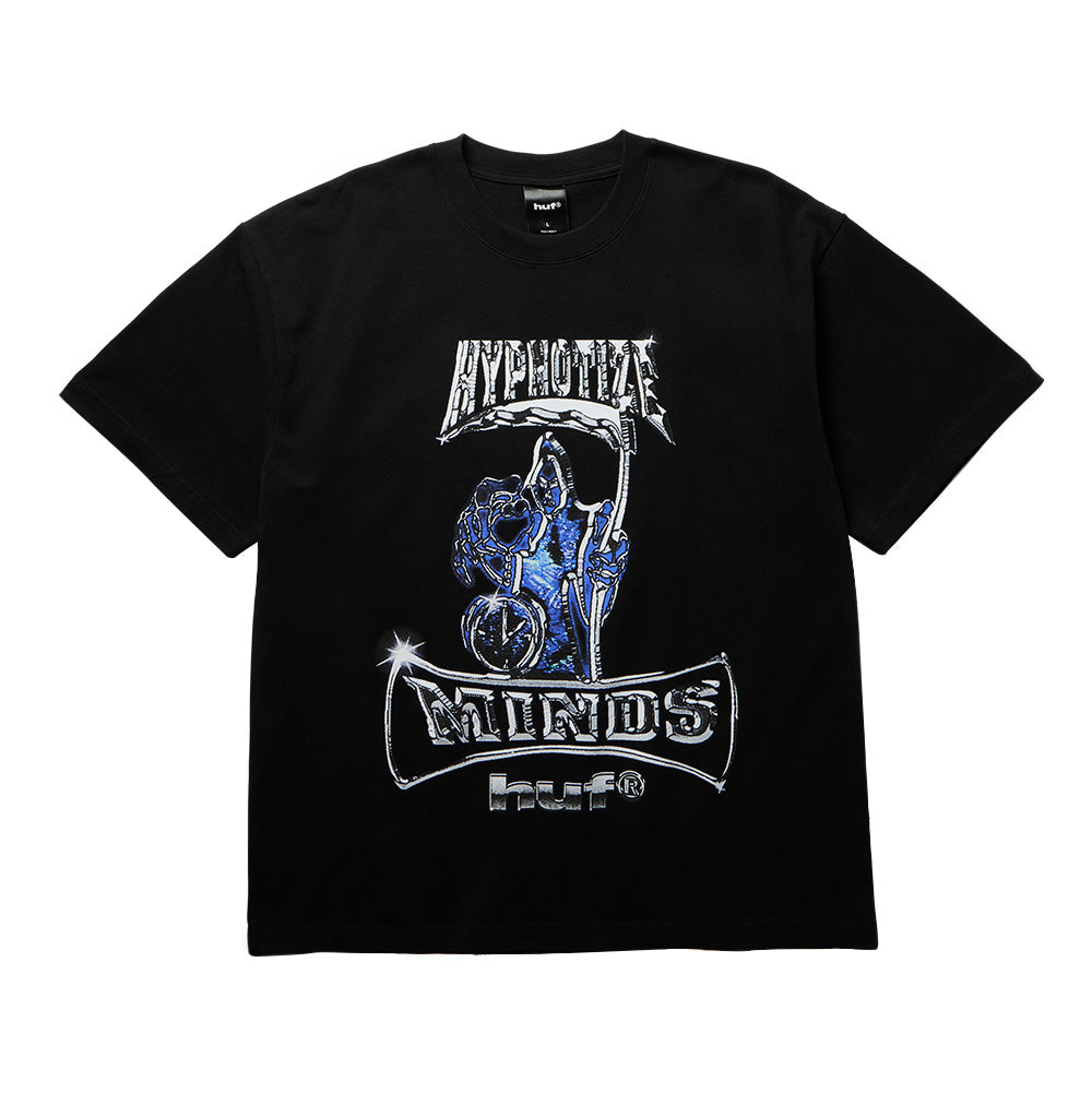 Front flat lay view of the black Huf X Three 6 Mafia Sizzurp T-Shirt, displaying a relaxed crewneck fit with a large center-chest screen print featuring the Hypnotize Minds hooded grim reaper cloaked in vivid cobalt blue, holding a sparkling hourglass and scythe, framed by chrome bevel-styled "HYPNOTIZE" and "MINDS" arched banners above a silver-embossed "huf®" logo.