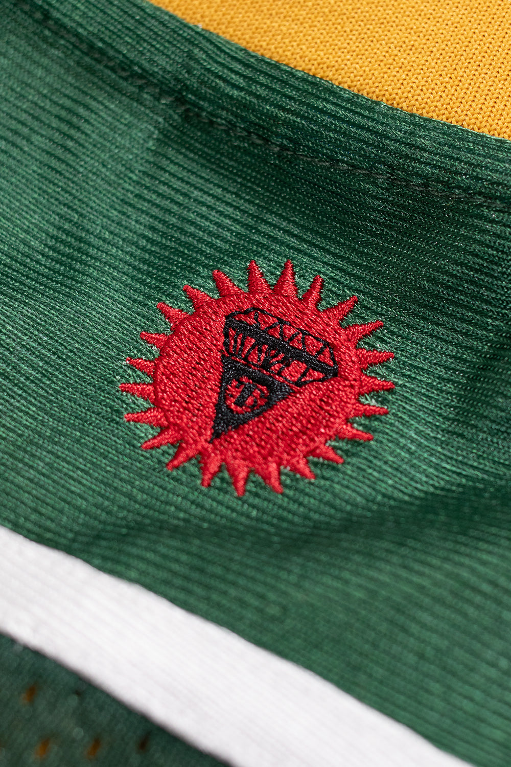 Ice Cream green football top with unique cherry applique, perfect for casual looks