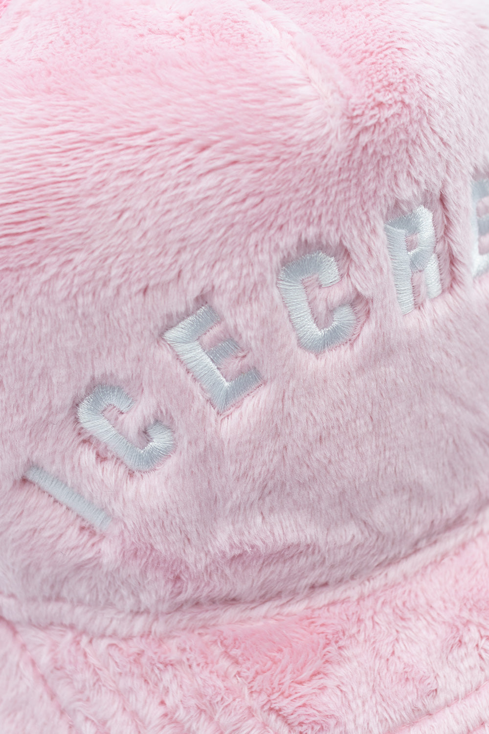 Ice Cream pink trucker cap with fur accents and iconic logo for a bold fashion statement