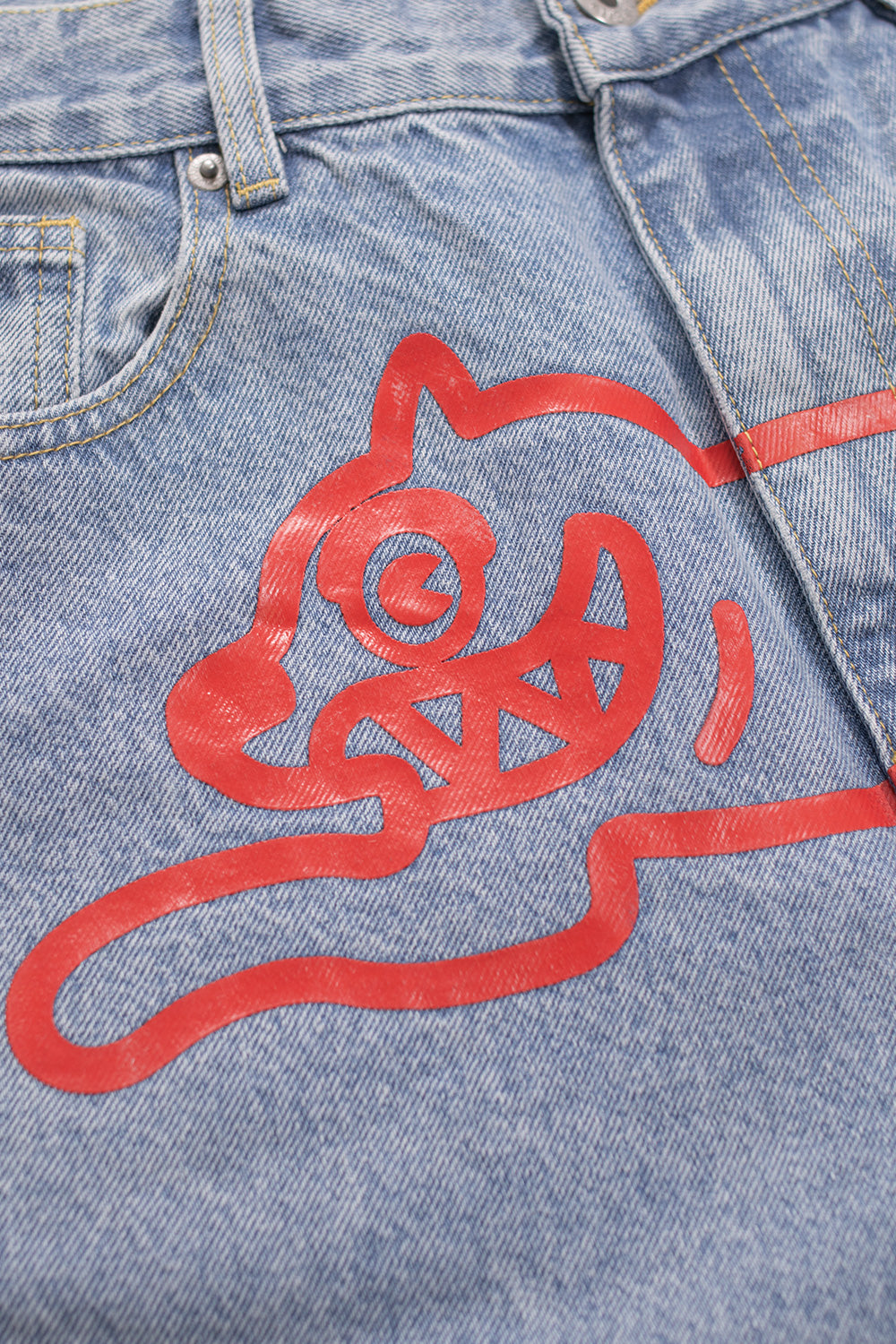 Casual Ice Cream denim shorts featuring red running dog print on light wash fabric