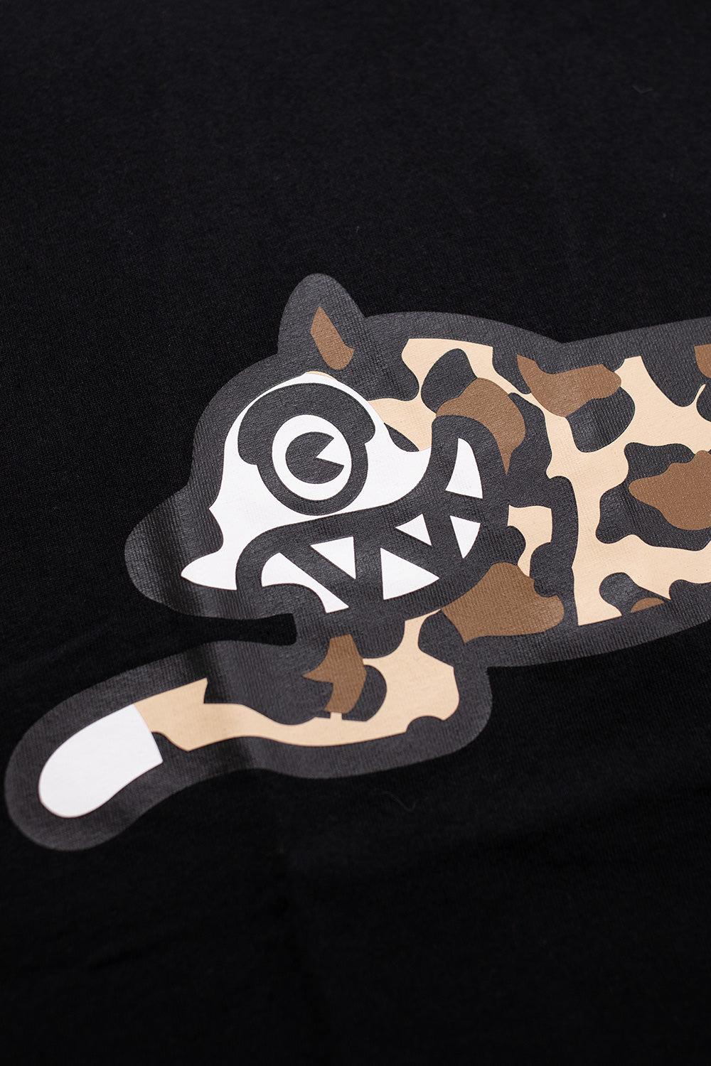 Casual Ice Cream black T-shirt with leopard print accents and Running Dog logo