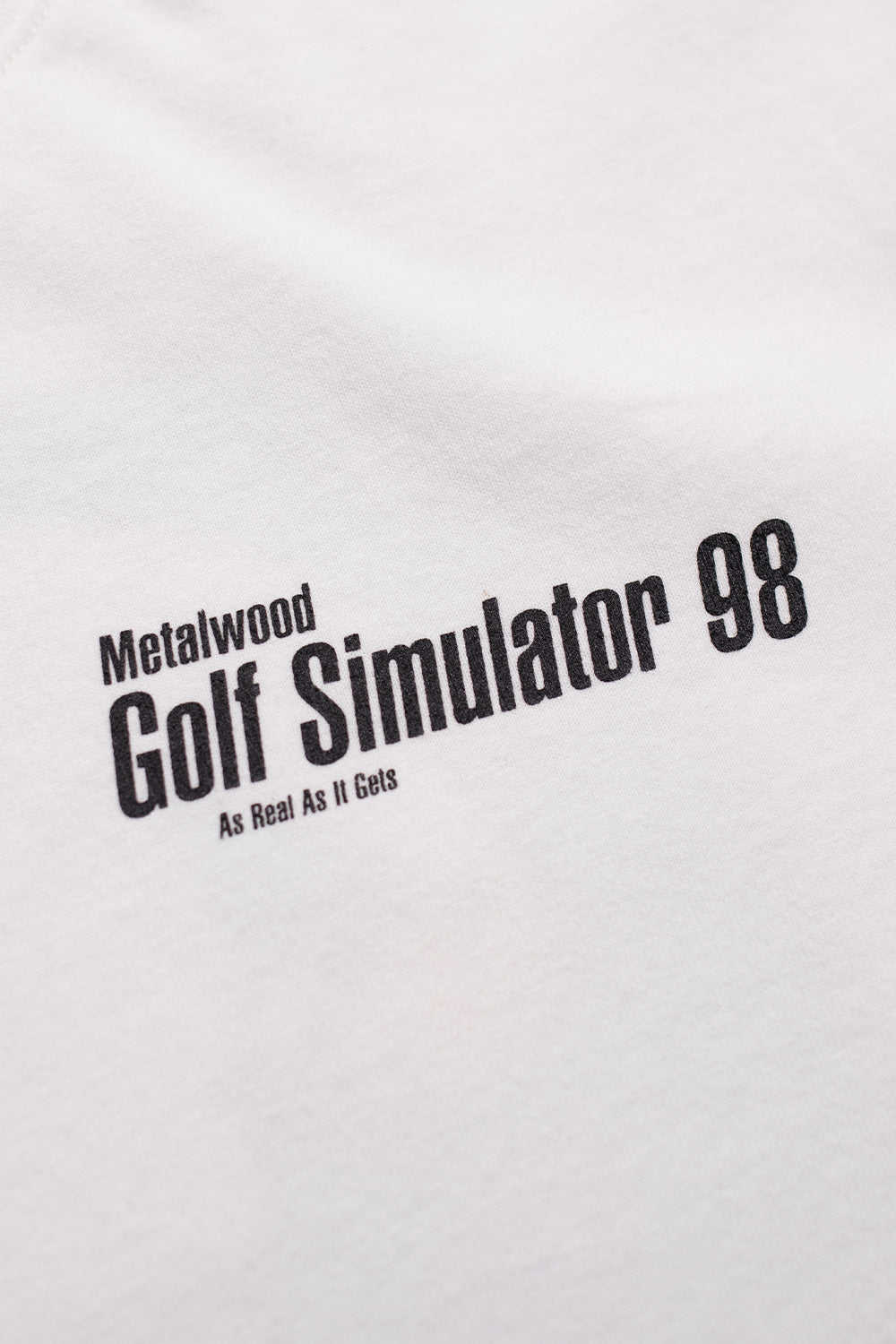 Lifestyle shot showcasing the Metalwood Studio Simulator 98 white T-shirt, ideal for urban fashion enthusiasts looking for comfort and design.