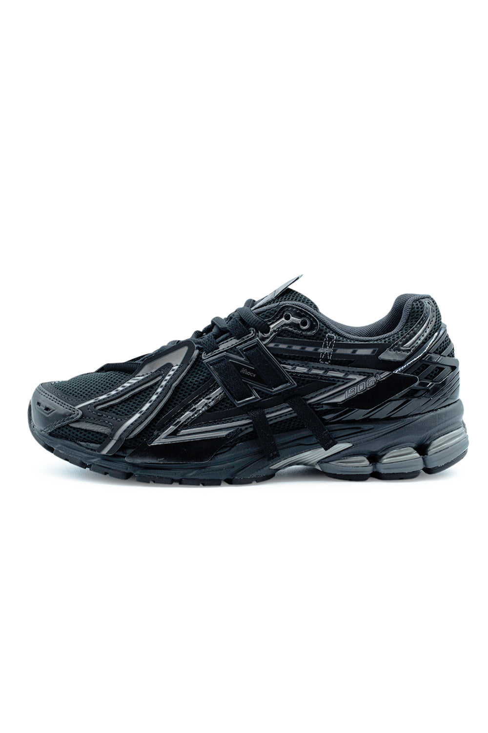 Side view of the New Balance 1906A M1906AF in Black, Dark Silver Metallic and Phantom featuring a deconstructed Y2K tech runner design, breathable mesh upper, glossy synthetic overlays, ACTEVA LITE cushioning and ABZORB SBS heel pods.