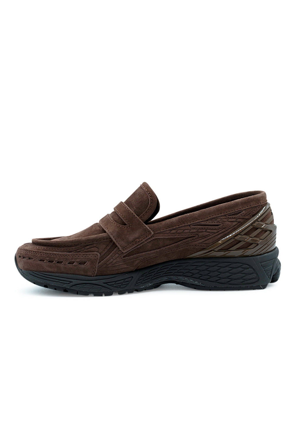 angled perspective New Balance 1906L slip-on sneaker highlighting sculpted midsole, retro 2000s running DNA and handcrafted suede loafer upper design