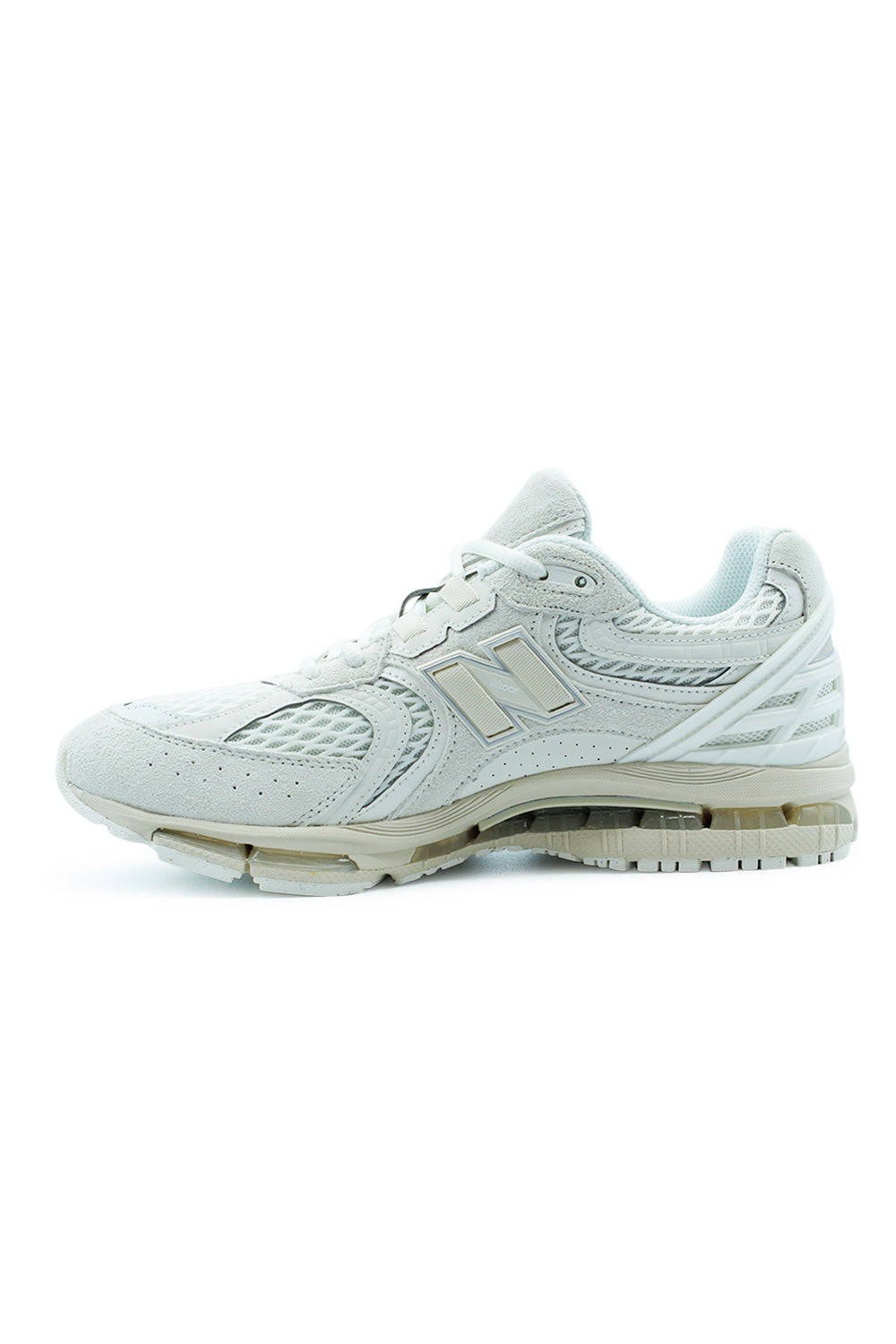 Medial side of the New Balance 1954R lifestyle sneaker displaying layered synthetic detailing, premium suede construction, lightweight mesh upper, responsive ABZORB cushioning and versatile Sea Salt / Linen colorway designed for daily wear.