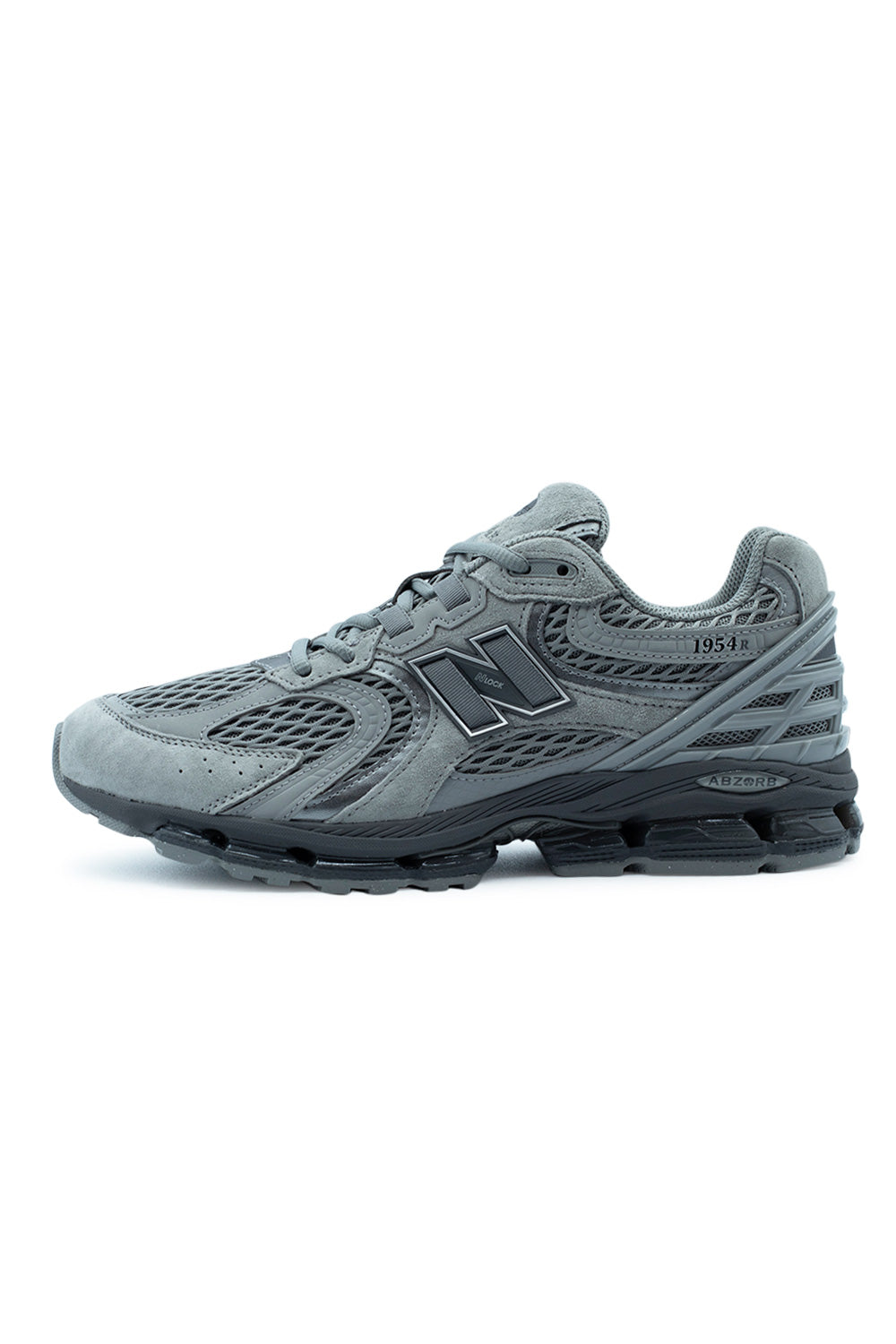Lateral side view of the New Balance 1954R sneaker in Slate Grey, showcasing the brushed pig suede overlays, coarse mesh base, N-Lock system, and black ABZORB midsole.