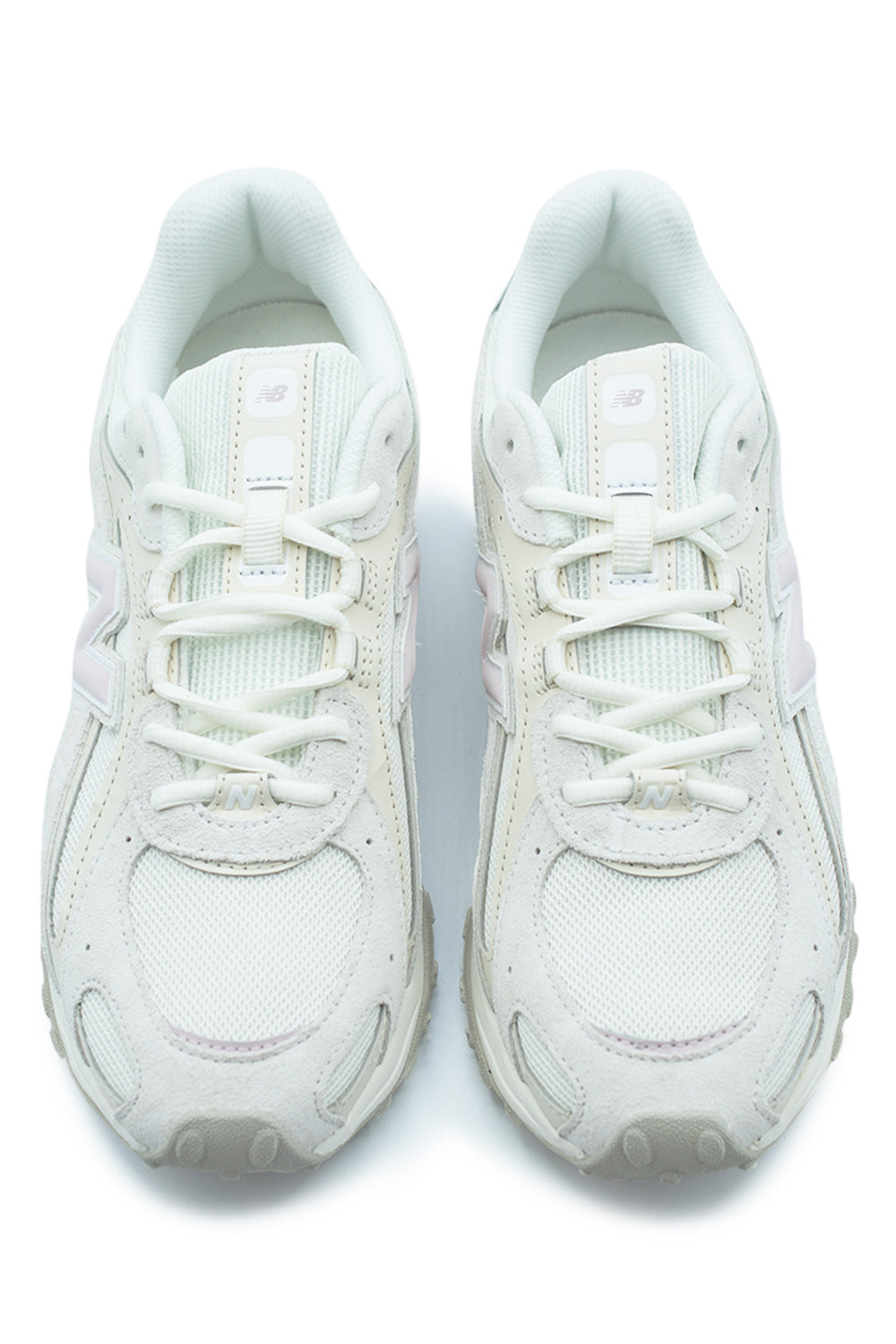 top view New Balance 204L Sea Salt Stone Pink featuring lightweight mesh toe box, soft suede mudguard, flat laces and clean low-cut everyday sneaker construction