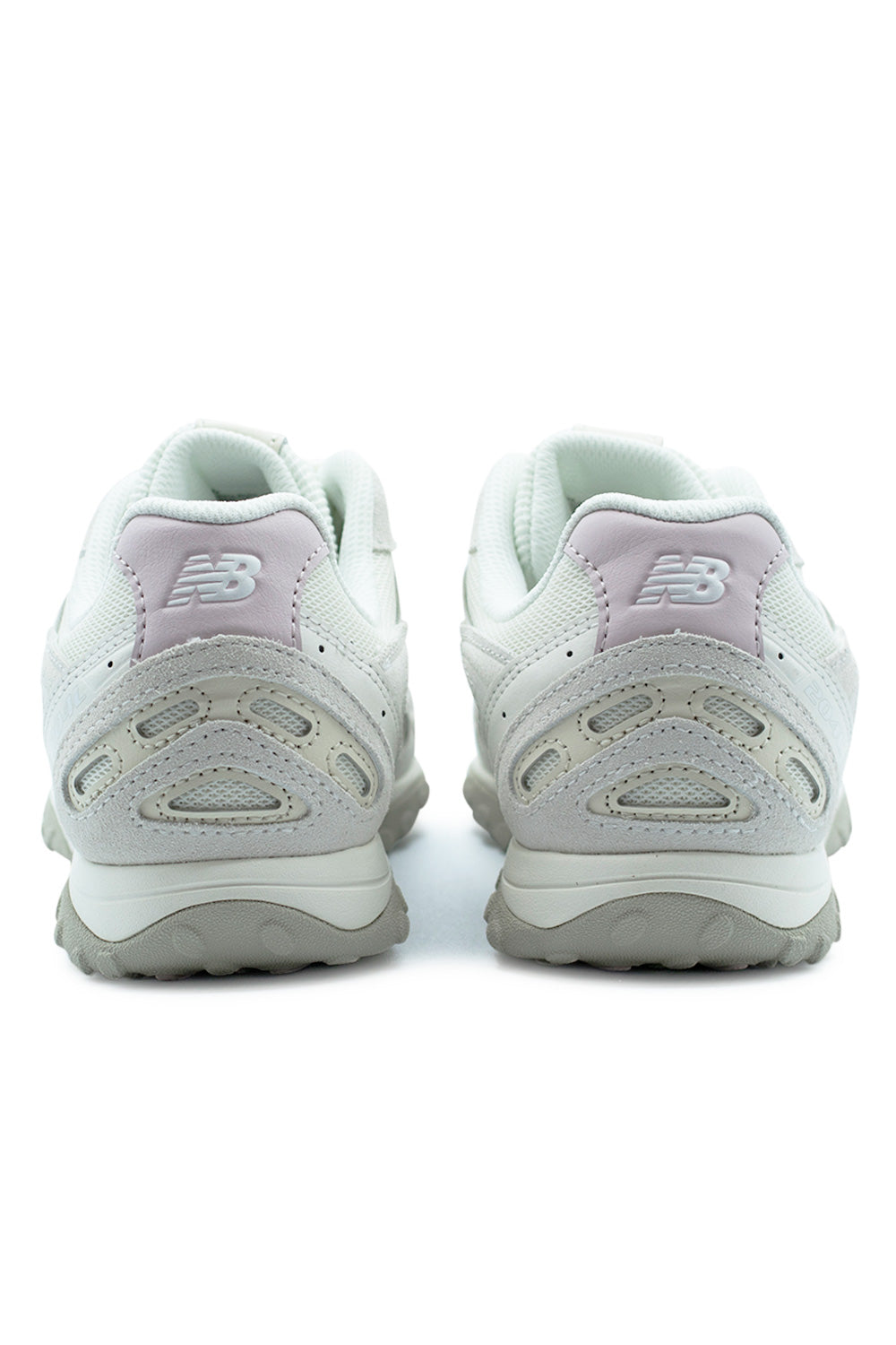 rear angle New Balance 204L sneaker in Sea Salt and Stone Pink with curved heel panel, layered suede detailing and flexible low profile sole for casual comfort
