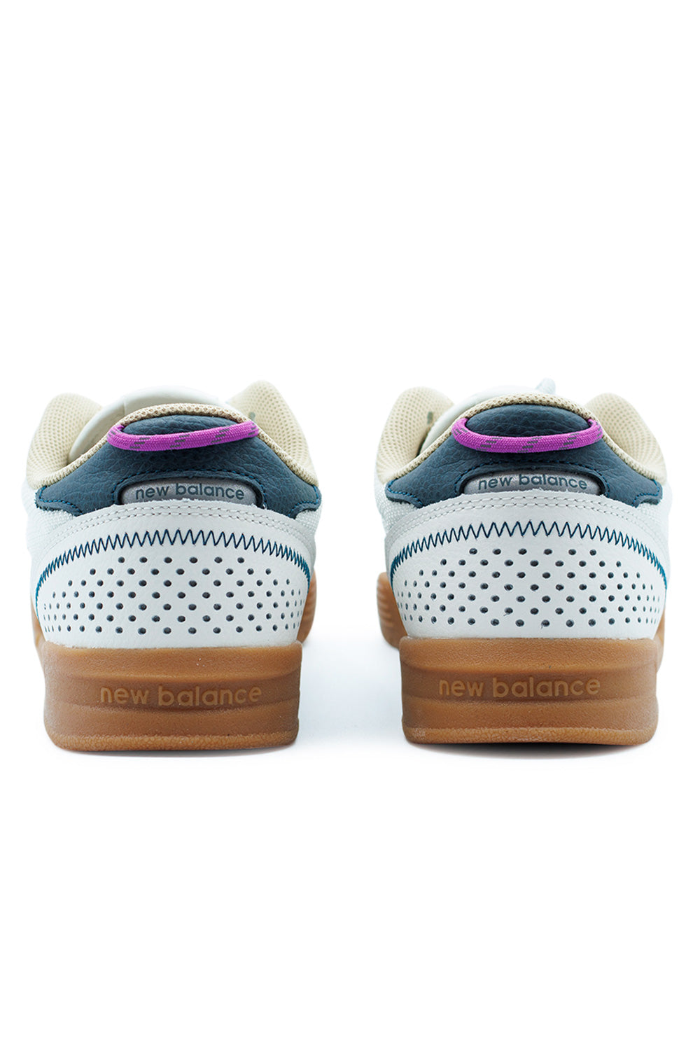 Close-up of the New Balance Numeric 440 V2, showing the textured upper and bold color combination of Sea Salt and Deep Ocean for a unique look.