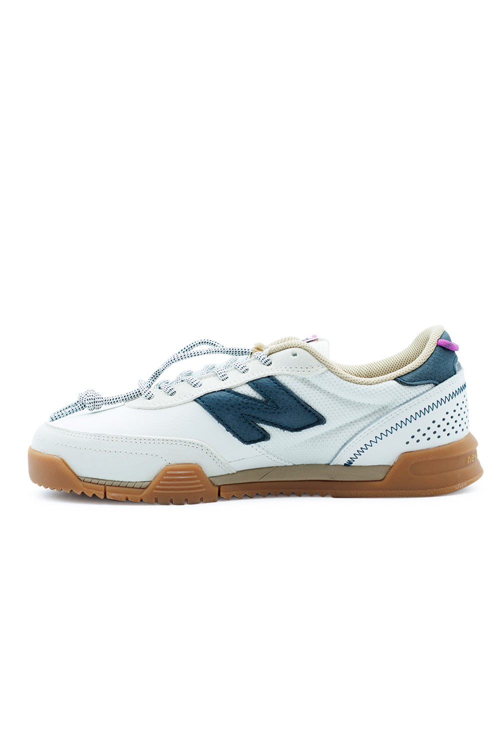 Detailed view of New Balance Numeric 440 V2 Low Trail Shoe, emphasizing its modern design and breathable material in Sea Salt and Deep Ocean.
