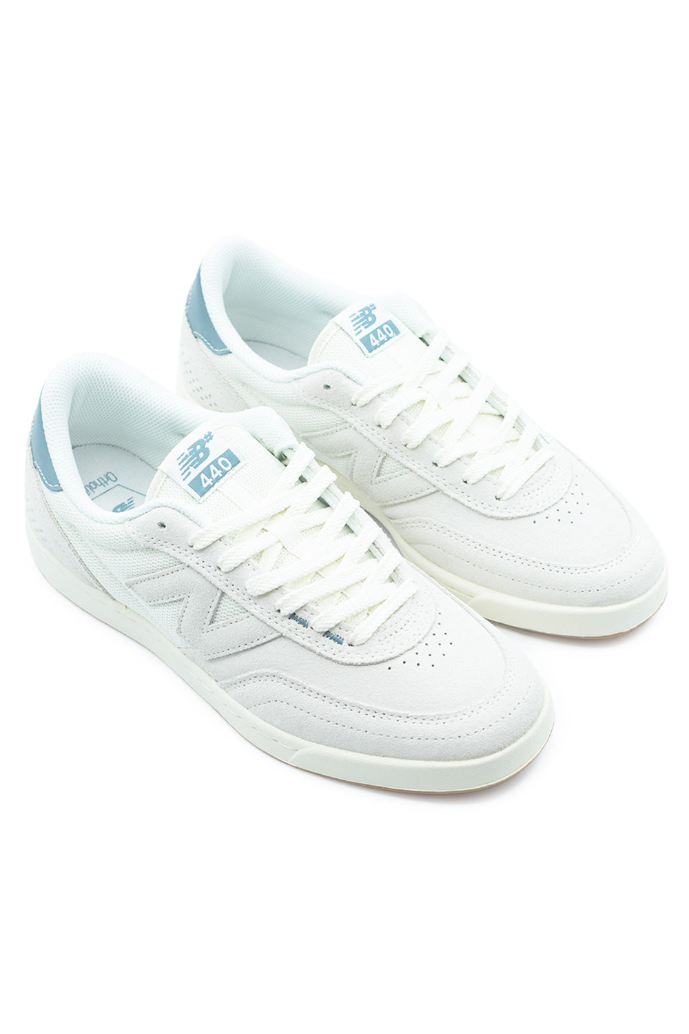 pair of New Balance Numeric 440v2 skate shoes combining retro 70s running style with modern skate technology, clean Sea Salt colorway perfect for streetwear and skating