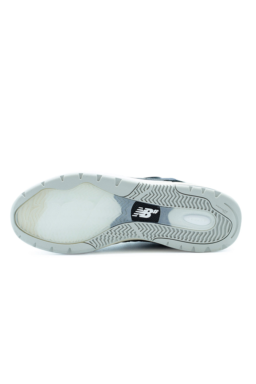 Outsole view of New Balance Numeric 933 Andrew Reynolds skate shoe featuring grippy rubber traction and impact-absorbing midsole technology