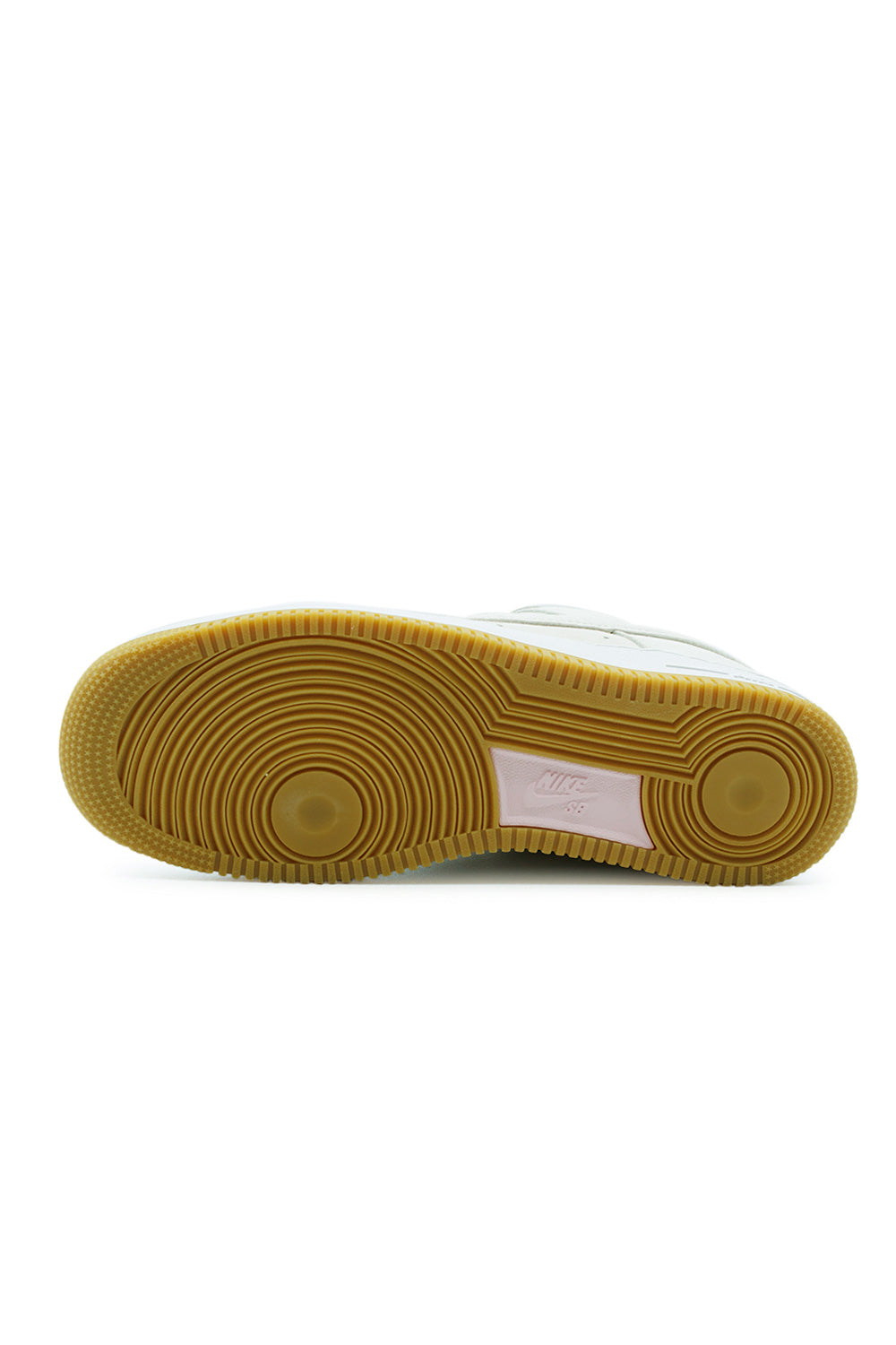 Nike SB Air Force 1 outsole in gum light brown rubber with circular traction pattern, skate-optimized grip design for superior control and flick during skateboarding