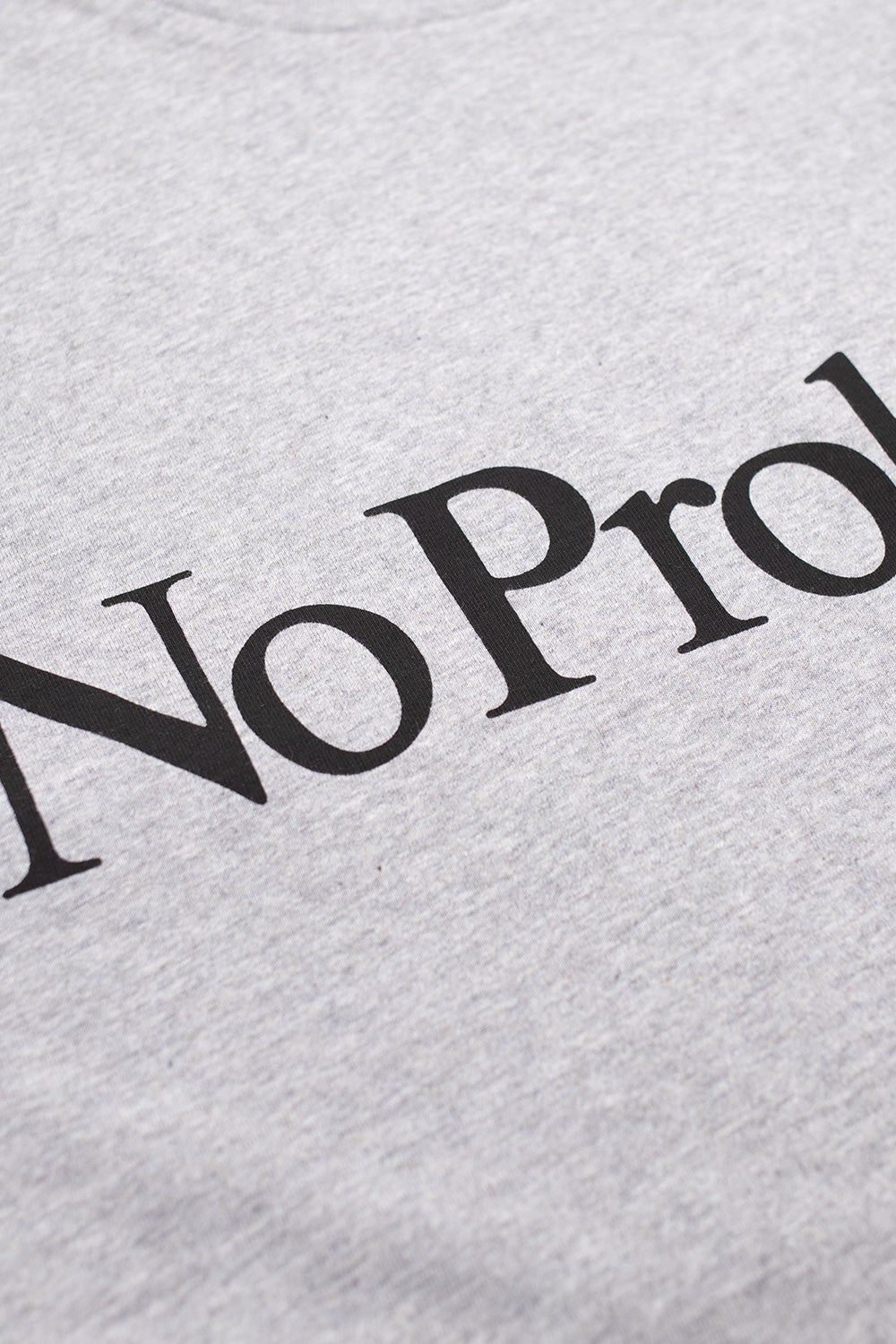 Grey Marl No Problemo T-Shirt by Aries – premium boxy fit cotton tee with graphic chest print, crafted in Portugal for modern streetwear.