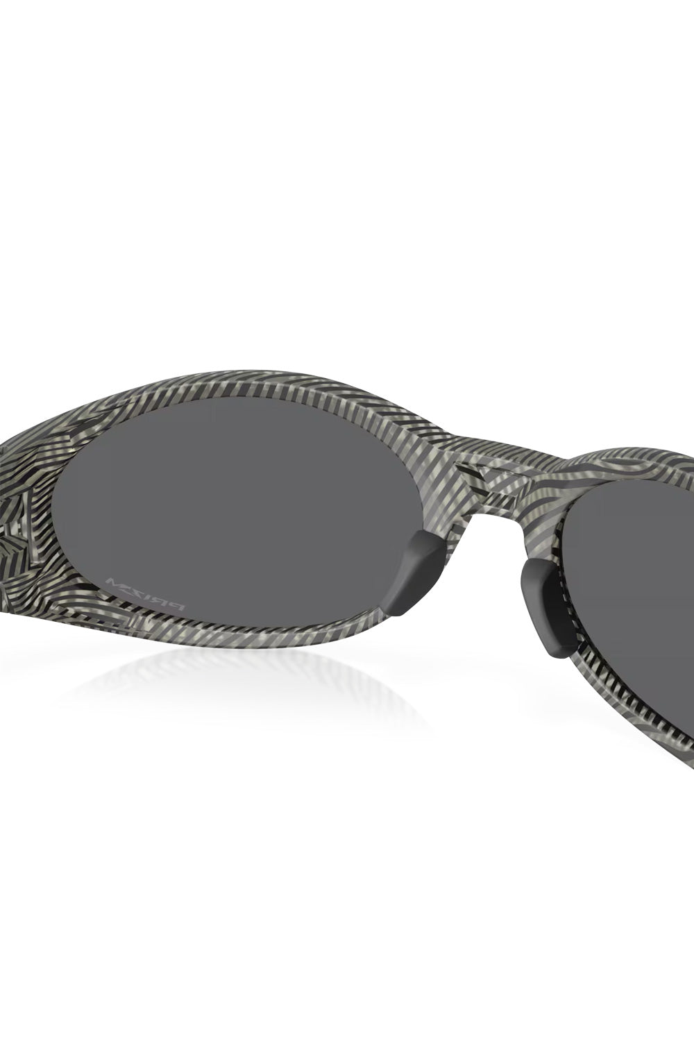 Interior view looking through the dark Prizm Black lenses of the Matte Grey Ink Fingerprint Oakley Eye Jacket Redux sunglasses frame.