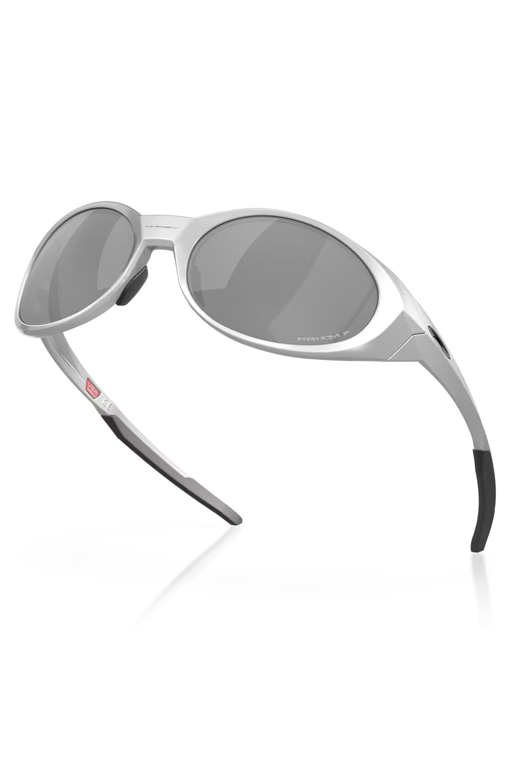 Dynamic angled view of the silver Oakley Eye Jacket Redux sunglasses, displaying the lightweight frame construction and no-slip Unobtainium nose pads.