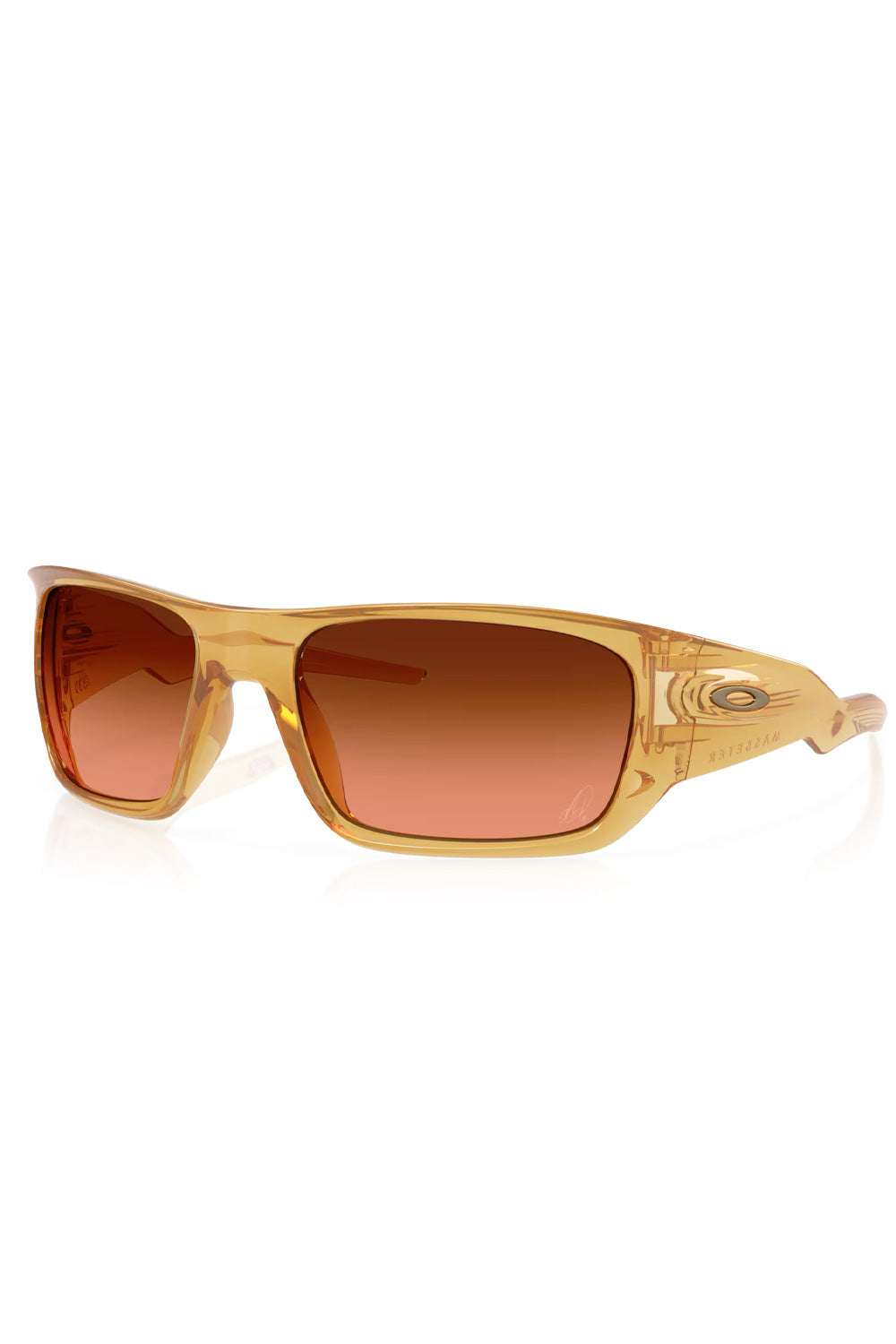 Three-quarter front view of the translucent curry-colored Oakley Masseter Alexia Putellas sunglasses with Prizm Brown Gradient lenses.