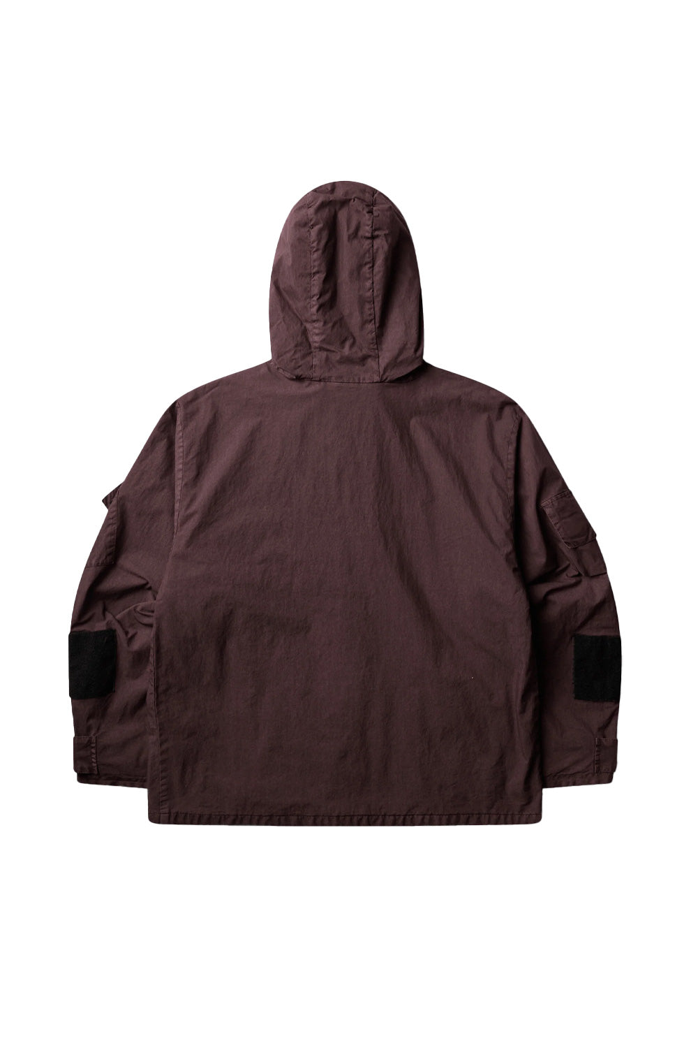 Back flat lay view of the plum grey Umbro Midfield Jacket, displaying the articulated panel construction across the shoulders, contoured multi-piece hood, utility sleeve flap pocket, black hook-and-loop patch accents on the lower sleeves, and clean straight lower hem