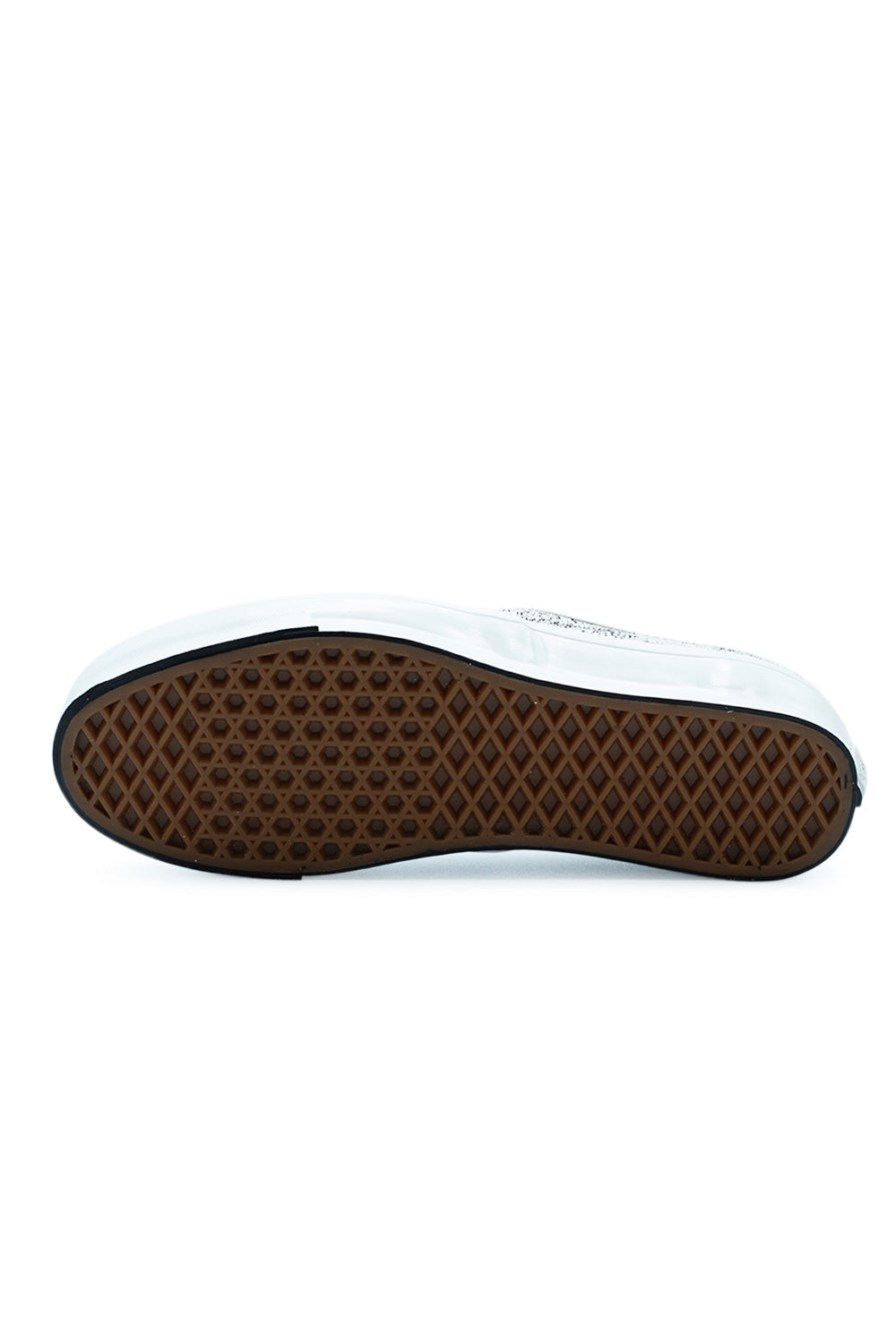 Bottom view of the classic dark gum rubber waffle tread outsole on the Vans LX Authentic 44 Overpaint shoe, engineered for classic skateboard grip and direct boardfeel.
