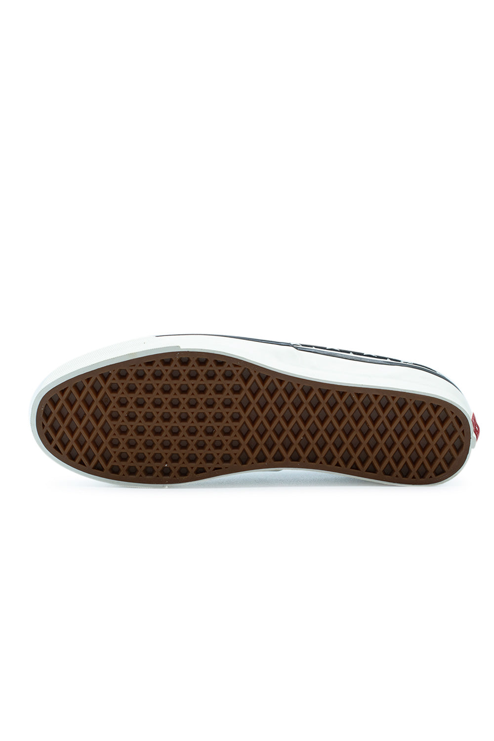 Full bottom view of the gum rubber outsole of the Vans LX Authentic 44 sneaker, detailing the original waffle tread pattern designed for optimal skateboard boardfeel and grip.